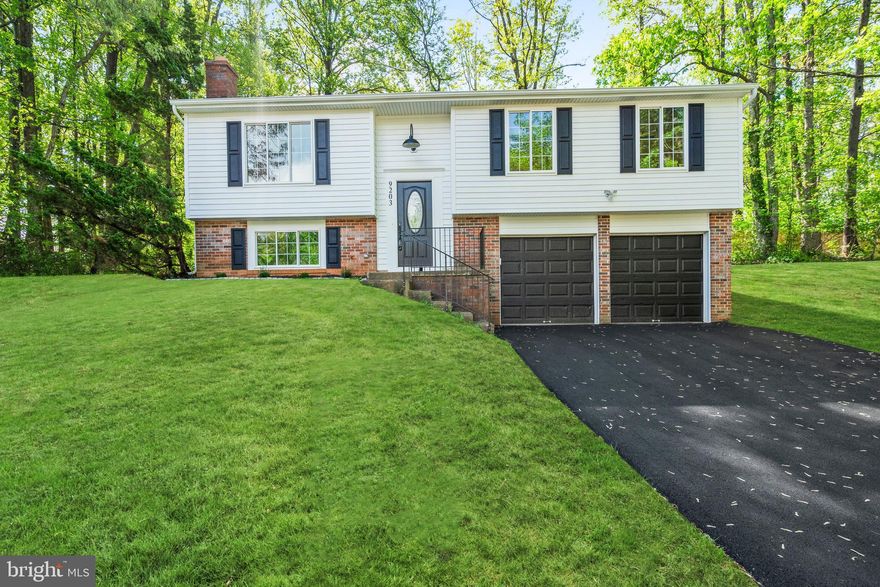 *Virtual Tour Uploaded* This refreshed, cul-de-sac, single-family home in Burke is a standout in the Lake Braddock School pyramid. The interior has been updated with a focus on "forever home" durability and upscale aesthetics. High-end tile and LVP run throughout all levels, providing a cohesive, modern look that is easy to maintain. The kitchen is fully upgraded with sleek quartz countertops, custom-painted cabinetry, and a full suite of brand-new stainless steel appliances. A window over the large kitchen sink, eat-in island, dedicated pantry, and glass slider to the rear deck complete this area. The kitchen opens to a breakfast area and a large family room, allowing for a natural flow.

Defying the typical split-level layout, this home has a uniquely oversized primary suite featuring a massive shower with a frameless glass door, a private water closet, and a large double vanity with quartz and premium fixtures. The massive walk-in closet comes equipped with a professional organizer system. The upper level is rounded out with two more generous bedrooms and a fully renovated hall bath.

The basement is a multifunctional living area centered around a cozy wood-burning fireplace with a wood mantle. Also included is a dedicated laundry room with a new washer/dryer, a deep laundry sink, a convenient half-bath, and direct access to the oversized, attached garage. Finding a garage of this size in this area of NOVA is a treat! The home is finished with solid-core doors for superior sound insulation and complemented by contemporary new light fixtures/recessed lights in every room. 

The exterior has been fully refreshed with new siding, garage doors, and a deck that are all maintenance free, so you can enjoy your over .3 acre in the cul-de-sac. Ideally located for modern living, the property is just minutes from the Burke Centre VRE station and major bus stops, offering a seamless commute to D.C. or Arlington. Residents enjoy immediate access many amenities including local favorites like Spartans Family Restaurant and H-Mart, alongside the vast trails and recreation at Burke Lake Park. HVAC 2026, Water Heater 2026, Roof within 5 Years, Windows 2026, Driveway 2026