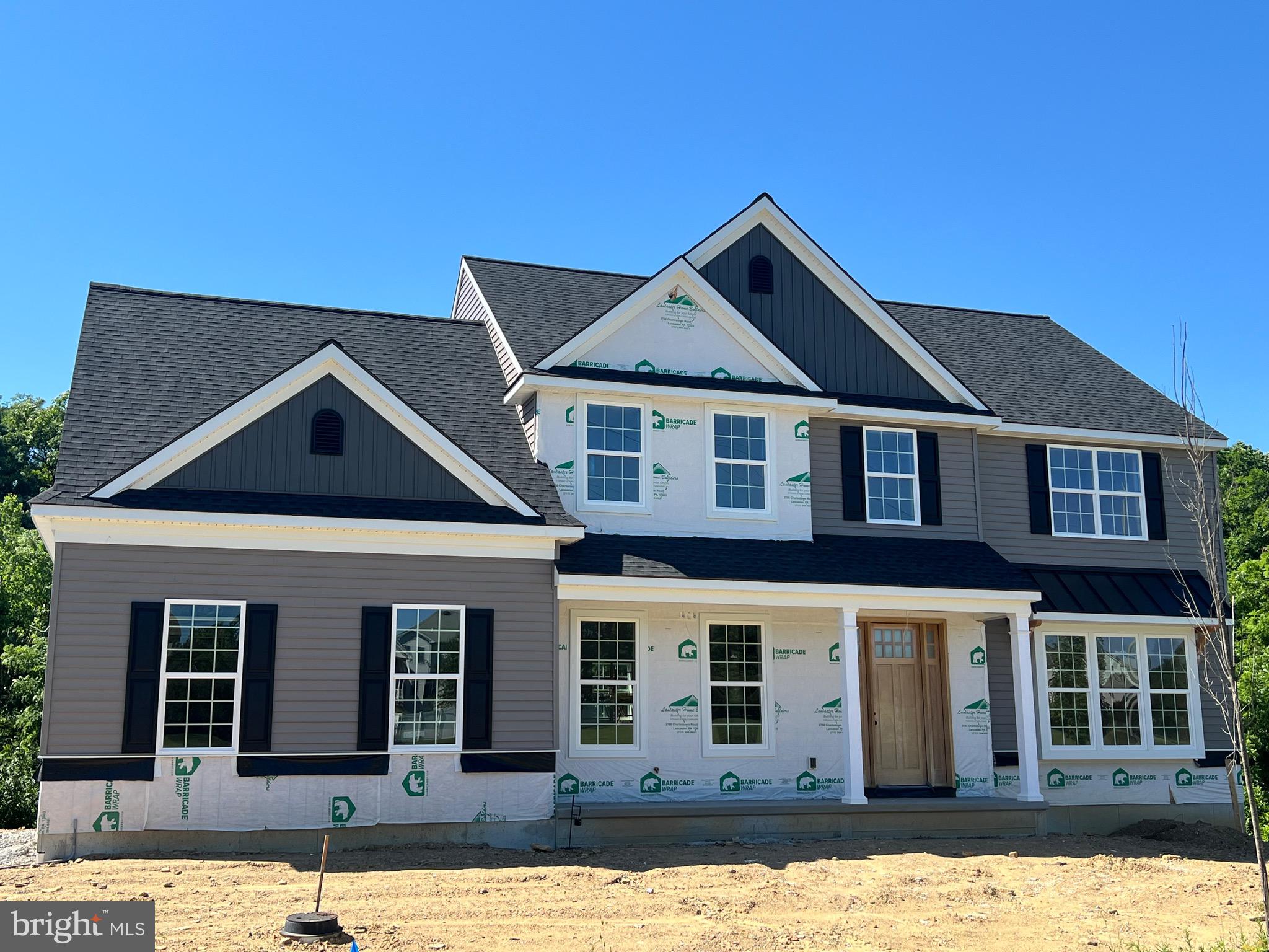 December Delivery! In the heart of picturesque Chester County, a new construction endeavor is taking shape in Avon Grove School District, promising an unparalleled blend of luxury, comfort and breathtaking views. Nestled on spacious lots, four single-family homes stand as epitomes of modern architectural marvels, offering a harmonious fusion of elegance and functionality. You are greeted by the allure of space and tranquility with each residence boasting its own generously sized lot. Whether it's for outdoor recreation, gardening, or simply enjoying the serene surroundings, these spacious lots provide ample room for all your desires. The homes themselves are a testament to meticulous craftsmanship and thoughtful design. An amazing open floor plan welcomes you, seamlessly connecting living spaces and creating an atmosphere of warmth and inclusivity. With 10 foot ceilings gracing the main level, a sense of grandeur permeates throughout, enhancing the feeling of openness and freedom. Panoramic views await from every window, inviting nature's beauty indoors and allowing you to revel in the changing seasons and stunning vistas that surround you. Step into the coffered ceiling Family Room, where sophistication meets comfort. The intricate detailing of the coffered ceiling adds a touch of architectural splendor, while the beautiful gas fireplace and abundant natural light create an inviting space for relaxation and entertainment. The expansive open floor plan effortlessly transitions from the Family Room to the Gourmet Kitchen, where luxury features abound. From exquisite cabinetry and high-end appliances to designer fixtures, every aspect of the Kitchen is tailored for both style and functionality. Luxury extends beyond the main living areas, with customization options available to suit your unique preferences and lifestyle. Whether it's adding a personal touch to the Master Suite or creating additional family recreational space in the Lower Level, the possibilities for customization are endless. In the Avon Grove School District, minutes from downtown Kennett Square, these homes offer more that just a place to live, they offer a lifestyle of unparalleled luxury and comfort. With spacious lots, amazing open floor plans, panoramic views and luxury features throughout, these residences redefine modern living in the most spectacular way. Call today and schedule your appointment. Photos of similar house plan and customization ideas from other homes we have constructed. Only Four homes to be built at this location. Lot sizes from 1.9 to 5.3 acres. This lot is 1.9 acres. This home is currently under construction and delivery date will be December.