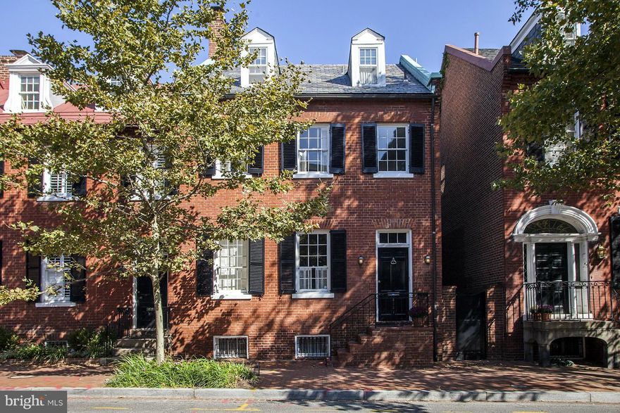 Fabulous Federal home built circa 1813 with period details, a large rear garden and a GARAGE! Beautiful pine floors, 4 fireplaces, and a large renovated kitchen with Eat-in island open to family room and patio. Large Master Suite with attached sitting room. Extensive Lower Level with plenty of storage space and lots of potential.