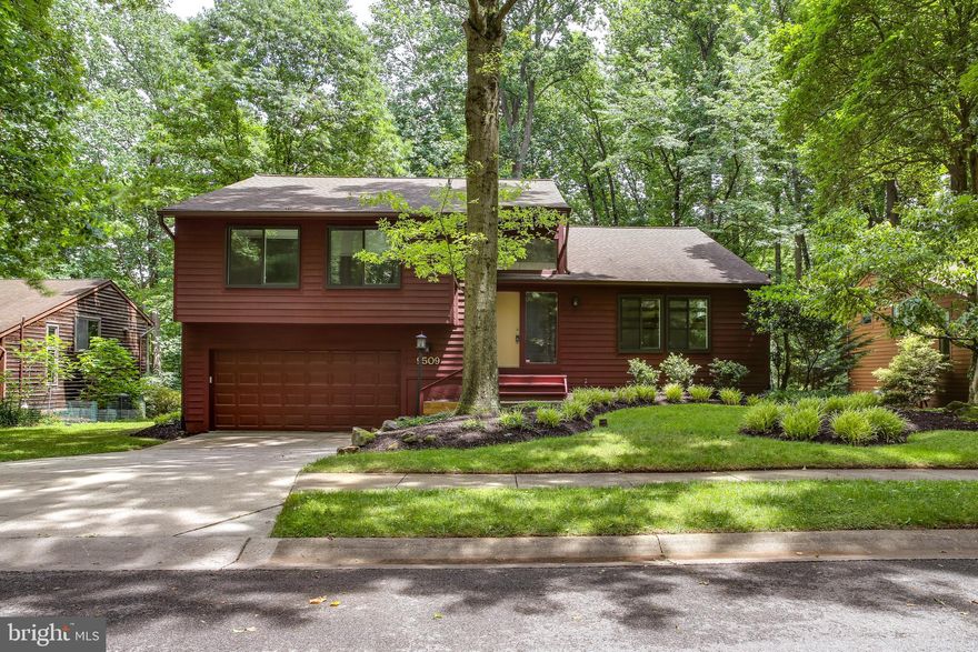 This contemporary home in the Village of Kings Contrivance is situated on a fantastic lot, surrounded by mature trees that provide peaceful views and ample shade during the warmer months. As you pass through the landscaped front yard and enter the main level, you're greeted by a sunken living room with a soaring vaulted ceiling and picturesque views of the front yard. Upstairs, the dining room features designer lighting and views of the entryway. The adjoining kitchen is spacious and clean, with additional space for a table in front of the sliding window overlooking the backyard. All of the windows in the home were replaced in 2017. Relax by the fireplace in the family room, which opens directly into the kitchen and provides access to the screened-in porch and deck. Skylights allow natural light to flow into the room. Down the hall, you'll find three nicely sized bedrooms with plenty of closet space and ceiling fans. The owner's suite includes an attached full bath, updated in 2021 with a new shower and double vanity. The full hall bath was also updated in 2021 with a new shower. The lower level is finished and perfect for your next movie or game night! Entertain guests in the rec room or head out the slider to the backyard surrounded by trees. A bonus fourth bedroom with an attached full bath is great for overnight guests. A fifth bedroom with a closet and egress window can easily be used as a home office or hobby room. Welcome home!