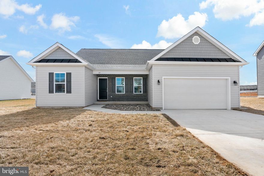 Immediate delivery, New construction 1800 finished sqft rancher in desired location close to Spring Mills.  Home features kitchen with island, granite countertops, pantry and stainless steel appliances, large family Room with gas fireplace, and formal dining room all on one level.   The primary bedroom has walk in closets and primary bath with corner soaking tub and tile shower with glass door.  Brick front porch, a 2- car garage with auto opener, a large rear concrete patio, concrete driveway and $10,000 closing cost assistance included.  Seller offering additional free fence!