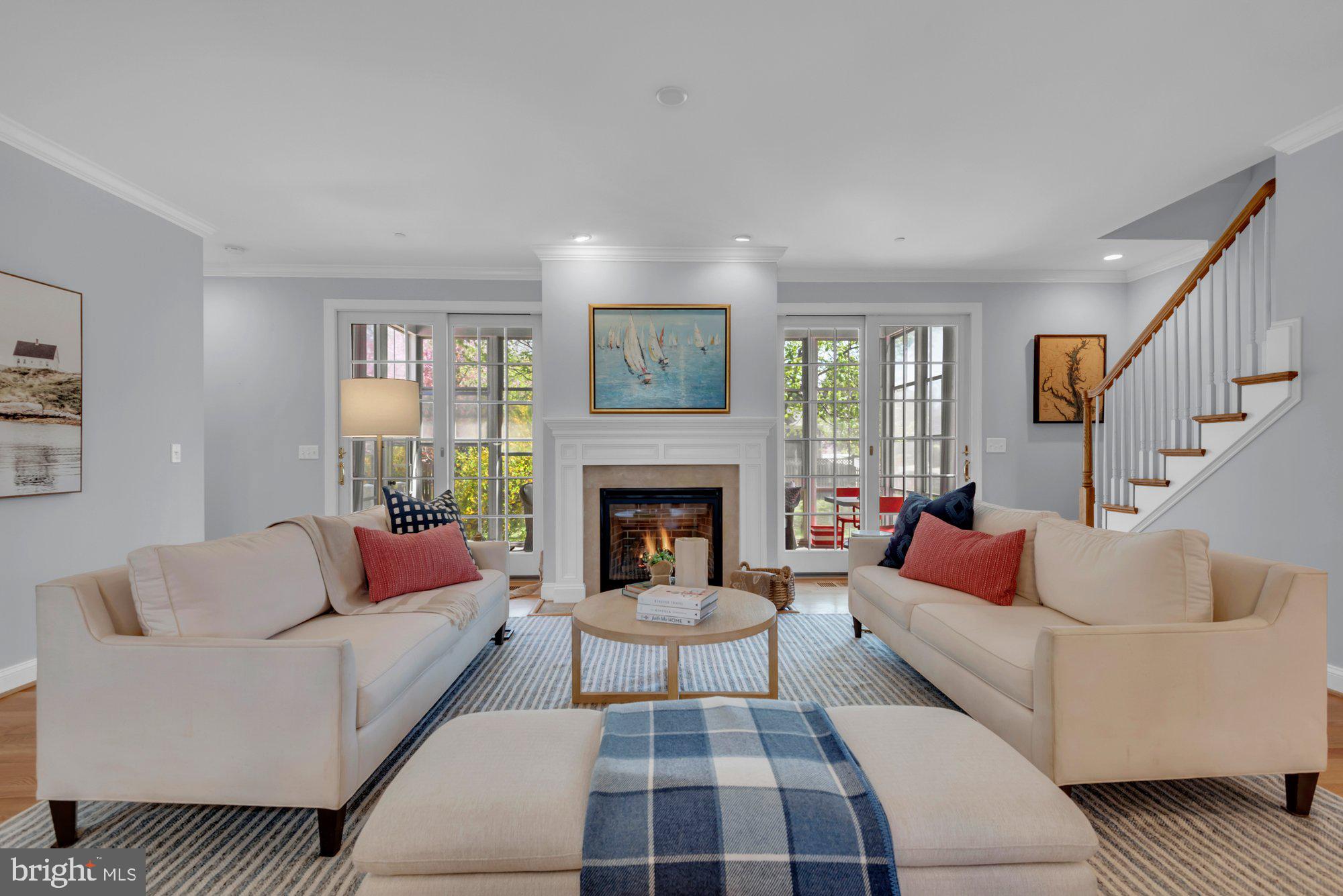 Open House CANCELLED, Property Under Contract
Welcome to 410 Melvin Avenue, an expansive Cape Cod style home on an exceptionally large property in the heart of West Annapolis. This is truly a walkable community with restaurants and shops around the corner, and waterfront access for kayaks, paddle boards and a boat launch just 2 blocks from your door.
Upon arrival you are greeted by a lovely wrap around front porch complete with requisite sitting bench and rocking chairs. Enter to find an open living and dining room area featuring beautiful hardwood floors, crown molding and a new gas fireplace. The main living area is great for entertaining, and flows nicely through glass doors leading to a wonderful screened porch and the backyard. The large kitchen features white cabinets, granite countertops and newer stainless steel appliances. The eat in kitchen has great natural light and a spacious nook for a kitchen table.
There are three bedrooms on the main level including the primary suite. Two bedrooms feature hardwood floors, large closets, and share a full bathroom. The primary bedroom is located at the rear of the home, and has a primary bathroom with a walk in shower and dual vanity. The large walk in closet with organization also conveniently connects to the laundry room located on the main level.
Walk upstairs to find a huge recreation and family room offering space for a wall mounted TV, large seating areas and no shortage of space for additional recreation such as gaming tables, workout equipment, or children’s play space. An additional large walk in closet is perfect for storage and organization, and the attached full bathroom with both a soaking tub and walk in shower completes this amazing space.
There are two additional bedrooms on the second level, one currently used as a home office. The real charmer is the new custom bedroom added by the current owners. Custom millwork, built-ins and amazing wallpaper are the highlights of this adorable children’s bunk room. Many other improvements have been added throughout the home including hardwood floors, crown molding, plantation shutters and new appliances.
The current owners have landscaped and enhanced this wonderful property, adding a classic picket fence to both the front and rear of the property. The wrap around front porch is the perfect place to relax and greet neighbors strolling by. The expansive backyard has a new private patio and fire pit with room for entertaining and space for kids to play. Parking needs are easily met with a driveway and an attached 2 car garage. An unfinished walkout basement with interior staircase access offers a large amount of storage, and with high ceilings this area could be finished if desired.
