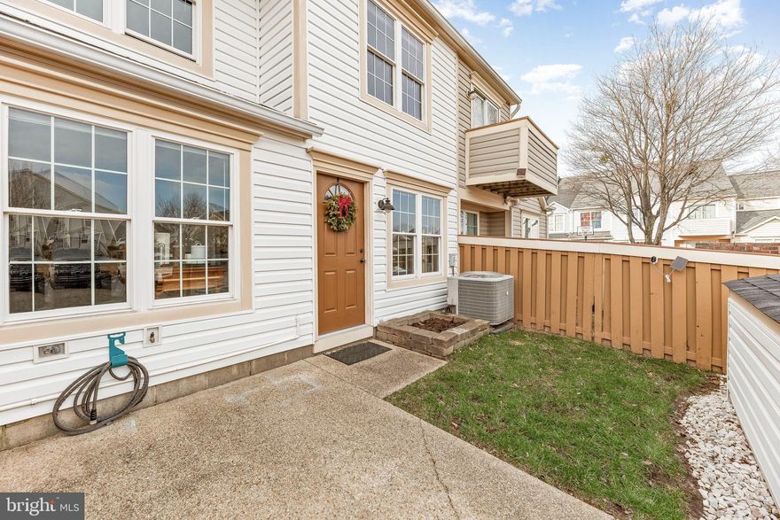 Welcome to this charming and spacious 3-bedroom, 2.5-bath townhome! Step inside to a generously sized living room, perfect for accommodating oversized furniture and creating a cozy gathering space. The open-concept design seamlessly connects the living room to the kitchen and dining area, making entertaining effortless—no one gets left out of the conversation! A half bath accommodates this floor.

The kitchen offers ample counter space and flows beautifully into the dining area, which easily fits a full-sized dining set. Conveniently located in this space, the stackable washer and dryer add to the home’s functionality.

Upstairs, on the third floor, the expansive primary suite is a true retreat, featuring a private ensuite with a double vanity and a surprise bonus—a private balcony! Imagine starting your day with coffee or tea while enjoying the fresh air. Down on the second level, you'll find two additional spacious bedrooms, each with plenty of room for bedroom furniture. A well-appointed hall bath, complete with dual sinks, provides added convenience for family or guests.

This home is an absolute gem, and at this price, it won’t last long. Schedule your showing today!