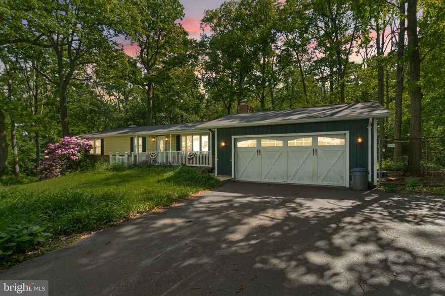 Tucked away in the serene countryside of Manchester, this charming ranch-style home offers the perfect blend of comfort, space, and natural beauty. Situated on just under 1.5 acres, the property is surrounded by mature trees and showcases peaceful, picturesque views in every direction. Inside, you’ll find a spacious and functional layout featuring 3 bedrooms, 1 full bath, and 1 half bath, offering convenient one-level living. The lower level expands your living space with a large recreation/entertaining area, abundant storage, and a dedicated laundry area. There’s also a framed-out space ready for a potential 4th bedroom, home office, or flex space. The attached 2-car garage adds everyday convenience, while the outdoor space is a gardener’s dream with established garden beds ready for the next owner to enjoy. Move-in ready, being sold AS-IS, this home also offers a great opportunity for new owners to bring their own style and updates over time. Enjoy the peaceful, private setting while still being just a short drive to Main Street and local amenities. A wonderful opportunity to own a quiet retreat with room to grow!