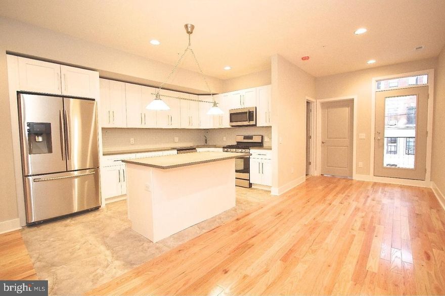 1436 Poplar Street, a contemporary Francisville condo building with a spectacular roof deck, is only 3 years old and just one block from the Broad Street Line! This modern construction unit offers a balcony, hardwood floors, stainless steel appliances, central air and washer/dryer all of which are energy efficient resulting in lower utility bills. 1436 Poplar Street is located a few minute's walk from such venues as The Met, Anytime Fitness, Lifesport Fitness, Kayuh Bicycles & Cafe, Mugshots Coffeehouse, Lorraine, South, Stephen's Green, Zuzu's Kitchen, Osteria and a hop skip and jump to public transport! Tenant pays for electricity and gas as well as a flat fee for water. Pet's welcome with refundable pet fee.