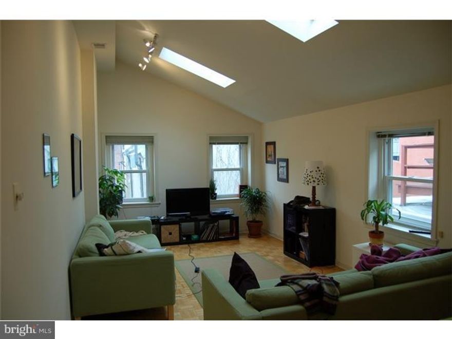 Renovated 2 bedroom, 1 bath apartment in Center City, Washington Square West neighborhood.  Dramatic living room with 3 windows and 2 skylights for lots of natural light, open to kitchen with granite breakfast bar, gas cooking, dishwasher, disposal.  Laundry washer/dryer in unit.  Fireplace in each bedroom.  Roof deck for outdoor enjoyment.  Unit will be professionally cleaned and painted.  Convenient to all that Center City offers, walk everywhere.  Close to Jefferson Hospital, PA Hospital, public transit, major highways, easy commute to UPENN, Drexel, HUP, CHOP