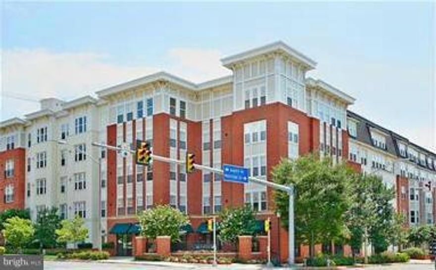 NEW PRICE!!  Absolutely Gorgeous 2BR/2BA ground level condo across from Metro! Granite Counters/SS Appliances,Tile Backsplash, Crown Molding, Open Floor Plan, Neutral Paint, Custom MBR Closet, Storage Unit and 1 Parking Space. All of this in the new Mosaic District with shops, restaurants and nightlife. Amenities include pool, gym, basketball court, party room, pub & concierge. Fantastic Location!