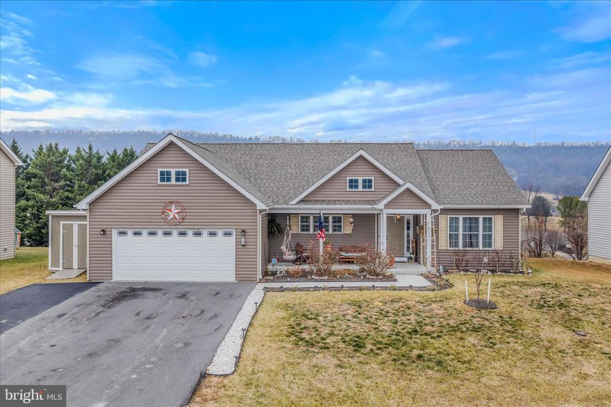 Welcome to this immaculate 3-bedroom, 2-full-bath rancher offering 1,912 square feet of thoughtfully designed living space, all set on a 0.32-acre lot with breathtaking mountain views. Built on a crawl space and maintained in pristine condition, this home blends comfort, functionality, and style.

The heart of the home is the gourmet kitchen, featuring granite countertops and a large granite island, stainless steel appliances, and abundant cabinetry—perfect for entertaining or everyday living. The open layout flows effortlessly into the main living areas, while a spacious bonus room at the rear provides incredible flexibility as a media room, home office, or playroom, with direct access to the back deck—ideal for relaxing and taking in the scenic views.

The primary bedroom suite offers a private retreat with an attached bath featuring dual sinks, while two additional bedrooms and a full bath provide comfortable accommodations for family or guests.

Outside, enjoy the black aluminum fencing, an oversized driveway with ample additional parking, and a yard that offers both space and stunning surroundings. With its combination of beautiful views, quality finishes, and exceptional condition, this home is truly move-in ready and a rare find.