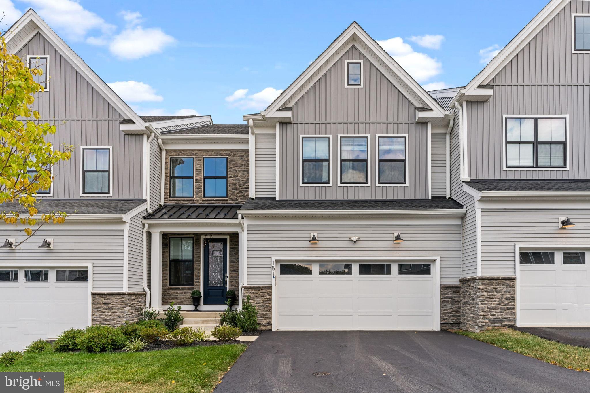 Sophisticated Townhome Living in Doylestown Walk
Nestled in the charming community of Doylestown Walk, this exquisite 2024-built townhome combines modern luxury with inviting comfort. Designed in a timeless side-by-side traditional style, the residence offers an elegant yet practical layout ideal for today’s lifestyle.
Step inside to a dramatic two-story entry filled with natural light and highlighted by an open overlook. The expansive two-story great room seamlessly blends the dining and living areas, anchored by a beautiful gas fireplace, perfect for cozy evenings or entertaining guests. Soaring 20-foot automated curtains add both drama and convenience, while a covered deck extends the living space outdoors, accessible directly from the great room.
The heart of the home is the gourmet kitchen, equipped with top-of-the-line Kitchenaid stainless steel appliances, including a built-in microwave, wall oven, sleek cooktop, and modern dishwasher. Ample counter space and stylish finishes make it as functional as it is beautiful.
The primary bedroom suite is conveniently located on the main level, offering a private retreat with a spa-like bath designed for relaxation. Upstairs, you’ll find two additional spacious bedrooms, a versatile loft overlooking the great room (complete with a closet). With two full bathrooms plus a half bath, there’s plenty of space for family and guests alike. All bedrooms each have, day-to-night curtains.
The unfinished walk-out basement, with 9 foot walls is plumbed with a full bath rough-in, providing endless opportunities for customization, whether you envision a home gym, media room, or guest suite. An attached two-car garage features a durable Polyaspartic floor coating and built-in cabinetry for optimal storage and function. With a rare 4-foot rear bump-out, this home offers more living space than many others in the neighborhood.
Outside, the low-maintenance exterior means you’ll spend more time enjoying life and less time on upkeep. Within Doylestown Walk, you’ll find a welcoming neighborhood atmosphere that’s perfect for leisurely strolls and connecting with neighbors.
This is more than just a home, it’s a lifestyle that blends modern living with timeless elegance. Don’t miss your opportunity to experience all that this stunning Doylestown Walk townhome has to offer.
Please see the Upgrades List for a more complete detailing of the $200K plus in upgrades this property offers.