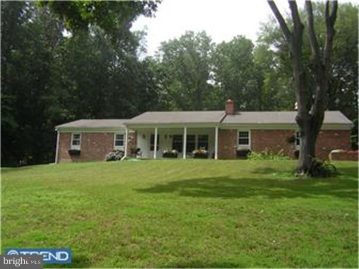 Ranch home with beautifully updated Kitchen, 3 Bedrooms, 2 full baths, 2 car garage, full basement. Freshly painted May 2014, new roof in April 2009, electric upgraded to 200 amp, all windows replaced in 2009. Now on public water. Situated on 4 acres of woods, this home offers privacy and quiet. The house is very clean, cute and ready for a new owner.