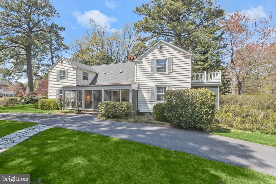 Welcome to 644 Ayrlie Water Road, a vintage 1930s cottage with stunning views of the Chesapeake Bay, forever protected by the property’s ownership of the land directly across the street, 643 Ayrlie Water Road. Designated a conservation easement, this secondary property, which is .4 in acreage, runs with the land and may not be built upon.

Enjoy the glorious daily sunrises and Bay views from the enclosed front porch of this delightful cottage located on a very quiet, beautiful street off the beaten path. Walking distance to the Gibson Island Club, “Secret Beach” is across the street right next to the lot belonging to 644 Ayrlie Water, and available for a dip in the Bay, picnic, or just digging your toes in the sand while reading your book!

Enter this quintessential cottage through a spacious enclosed porch into a simply magnificent wood-stained Great Room with Cathedral ceilings, visible beams, and two matching staircases on either side, each staircase leading to two bedrooms and a full bath. A huge woodburning fireplace graces the Great Room. Also on the main level is a spacious dining room perfect for entertaining, a renovated Kitchen, inviting Den, and Primary Bedroom with Full Bath. A lovely wraparound porch runs along on the backside of the house overlooking the woods, and a screened porch off the Kitchen provides delightful water views. A garage is connected to the house and may be accessed through stairs inside.

Information on Gibson Island:
Gibson Island is a private island within one hour of Washington, D.C. and Baltimore offering an absolutely extraordinary setting.  The Island comprises 1000 acres with seven miles of shoreline. Two thirds of the Island is undeveloped and is owned by the Gibson Island Corporation, the homeowners' association.  The remaining third is residential home sites. 
Gibson Island is located on the western shore of Maryland, so there is no need to cross the Bay Bridge. On the Island is a 43-acre spring fed freshwater lake in which one may enjoy non-motorized watercraft activities such as paddleboarding, canoeing, kayaking, fishing and swimming.  
The Island offers enormous privacy and security--there is an entry gatehouse staffed 24+Hours and the Island is patrolled by the Gibson Island Police Force (GIPD).  The Gibson Island Corporation Service Department offers yard maintenance and landscaping and other services for homeowners.  There is a full-service yacht yard.   From the Island, it is just a 20-minute drive to BWI Airport and the neighboring Amtrak train station.  
The Island houses a private country club (membership by invitation) offering yachting through the Gibson Island Yacht Squadron, fine dining year-round, tennis, an award-winning Charles Blair Macdonald designed 9-hole golf course, swimming, croquet, skeet shooting, and more.  (C)