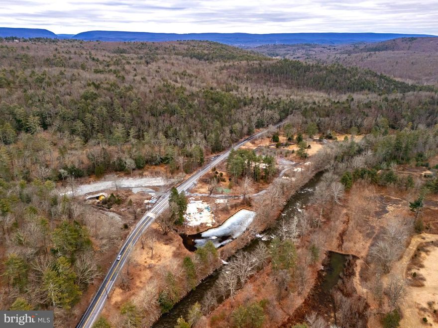 The Poconos, the primary tourist destination in Pennsylvania, is conveniently located two hours from bustling cities like Philadelphia and New York. It offers a serene escape for those seeking relaxation and outdoor recreation. However, the region faces challenges due to an influx of short-term rentals with exorbitant fees. To address this, a luxury resort is urgently needed. This substantial 70-acre parcel zoned commercial-resort presents an ideal opportunity to fulfill this need. 

The property encompasses a diverse range of amenities, including waterfalls, multiple creeks stocked with trout, hiking trails, sports courts, a stocked scenic pond for fishing or ice skating, outdoor pavilions, hunting opportunities, breathtaking views, and more. The possibilities for customization and profitability are limitless. The Poconos lifestyle revolves around outdoor adventures, and this property embodies that essence. By capitalizing on this unique selling proposition and highlighting the region’s allure as the premier tourist destination in Pennsylvania, a highly profitable venture can be achieved. Creating a memorable experience for families who cherish outdoor activities will ensure long-term success.

 This property holds immense potential due to its enormous size, strategically situated location, and historical significance due to it once being known as the Penn Hills Resort. Some other great features of the location are the close proximity to multiple ski resorts, Mount Airy Casino, Bushkill Falls, multiple nature reserves and state parks, endless shopping at the Tannersville outlets, etc. For those with the courage and vision to undertake this project, the rewards could be enormous. Proper development could transform the Poconos as a whole, making it a game-changer for the region’s tourism industry. 

Owner Financing Available to qualified candidates.