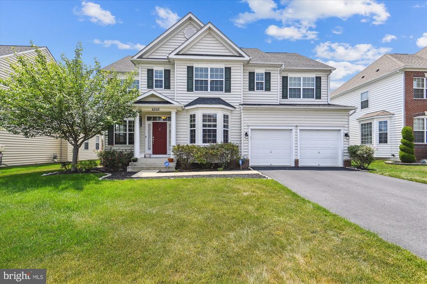 Spectacular Beazer Homes colonial in Linton at Ballenger. This 5BR/4.5BA colonial features almost 5,000 square feet of living area on three levels plus a two-car garage. Special features include a great sense of light and spaciousness with 9-ft. ceilings on the main level. Model home décor with new custom painting; elaborate moldings; hardwood floors, ceramic tile, and new designer carpeting throughout; gourmet kitchen with center island, cherry cabinets, granite countertops, glass tile backsplash, and stainless appliances opening to breakfast room and glorious family room; upgraded bathrooms with designer ceramic tile flooring and wall surround; recessed lighting, upgraded lighting fixtures, and custom blinds throughout; covered front portico entrance and entertaining rear yard with cobblestone paver patio, stone grill surround, and outdoor string lighting. BONUS barely visible OWNED (not leased) solar panels on the rear roof provide green savings...both with the environment and your wallet.  Foyer entrance with overhead and side transom windows, hardwood flooring, and powder room; double glass French door entry to study with bay window; formal living room with wide-cased opening and dining room with decorative columns separating the two rooms; gourmet kitchen with 42-inch raised panel cherry cabinets, KitchenAid stainless appliances, granite countertops, glass tile backsplash, center island/breakfast bar, and walk-in pantry; breakfast room with chandelier and sliding glass door to rear yard and enormous cobblestone paver patio; family room off of kitchen with marble gas fireplace and ceiling fan; staircase to upper level landing with recessed lighting, chandelier, linen closet, and laundry room with utility sink and washer/dryer; primary bedroom suite with ceiling fan, sitting room, and two walk-in closets with built-in multi-tier shelving; luxurious primary bath with designer tile flooring, two oversized vanities, corner soaking tub, oversized ceramic tile walk-in shower with frameless glass enclosure, and separate water closet; second and third bedroom with walk-in closets and shared buddy bath; fourth bedroom en suite with private bathroom; lower level with recessed lighting throughout featuring a recreation room, exercise area, fifth bedroom with walk-in closet, fourth full bath, and storage room; new gas HVAC (2023), and new tankless gas water heater (2025). The 9.62-kW solar panel system with 26 panels is OWNED, not leased. No monthly payments for the new owner, just utility cost savings and income from SREC credits.  The system covers about 76% of our home’s electricity needs, resulting in savings of $140 to $220 per month ($1,680 to $2,640 per year). This monthly savings, if equated to mortgage payment savings at today’s rates, is equivalent to $22K-$35K in purchasing power for this particular house compared to others without solar.