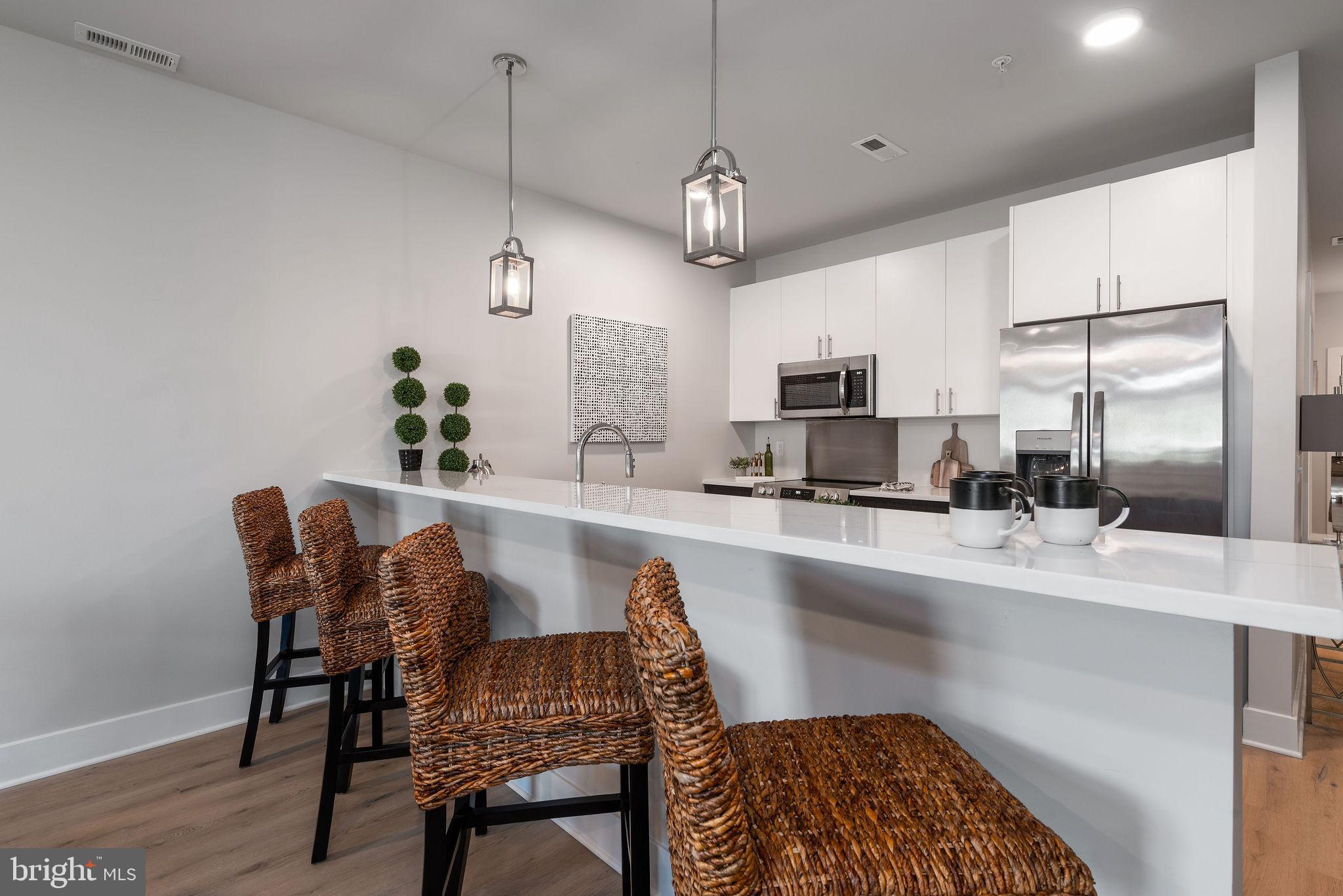 FLATS AT COASTAL STATION - Residential