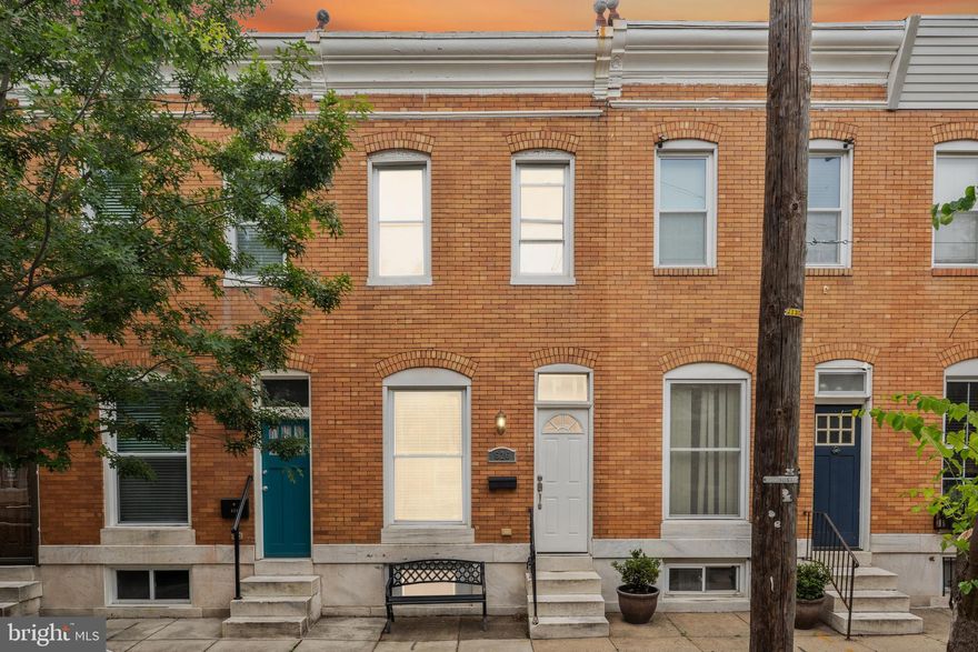 Welcome to 626 S Newkirk St! This open floor plan rowhome features exceptional upgrades throughout this home that was meticulously kept by the previous owners. Enjoy the expanded gourmet kitchen, with upgraded appliances, granite counter-tops and breakfast bar. The living area has warm recessed and pendant lighting, gleaming hardwood flooring, double pane thermal windows, insulated doors and upgraded sliding glass doors. Upstairs you will find 2 bedrooms and 2 bathrooms; The Primary Bedroom has an En-suite Bathroom and large closet. Downstairs you'll find a living area with your 3rd bedroom; basement also equipped with a wet bar, full bathroom, and laundry room with high efficiency appliances. All of this plus a level walkout basement to your private parking pad in the city! Call to book your tour today.