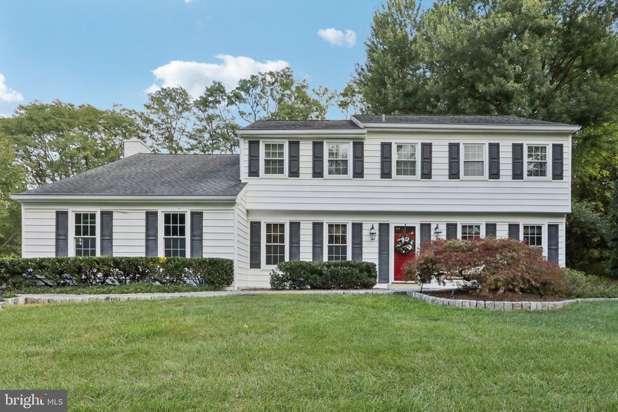 Welcome to 294 Batleson Rd in Ambler, nestled within the award-winning Wissahickon School District. This timeless colonial sits on just over an acre of beautifully landscaped grounds and offers more than 3,100 square feet of living space, thoughtfully designed for both everyday comfort and elegant entertaining. A winding bluestone walkway and mature landscaping create a warm first impression. Inside, the foyer introduces a flowing floor plan. The eat-in kitchen features rich wood cabinetry and a large walk-in pantry that is just around the corner in the hallway. Open to the family room with recessed lighting and a brick wood-burning fireplace, this heart of the home is ideal for gathering. A spacious living room offers versatility, while the formal dining room exudes classic colonial charm. Just off of the family room sits the sunroom with heating and cooling for year-round use. This spacious room floods with natural light and opens to two bluestone patios overlooking the private rear yard framed by mature trees. Upstairs, the primary suite has everything you need. The ensuite bath features a glass enclosed tiled shower, built in soaking tub and large vanity. The custom walk-in closet provides exceptional storage  Down the hall is another bedroom with it's own three piece bath that would make a great guest room. Three additional bedrooms plus a well appointed hall bath with a double vanity and walk in shower complete the second floor. Additional highlights include an attached two-car garage, a dry unfinished basement with full perimeter French drain, a side-yard shed, and recently upgraded high-efficiency HVAC along with energy-efficient double-pane windows. Set in one of Ambler’s most sought after neighborhoods where homes rarely come to market, this residence offers the perfect blend of privacy and convenience. Step outside to trails along the Wissahickon Creek or stroll to vibrant downtown Ambler. Impeccably maintained and move-in ready, 294 Batleson Rd is a home you’ll be proud to call your own.