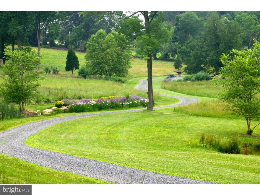 Set down a long drive on 40 park-like acres near sought-after Birchrunville, sits this stunning arts and craft contemporary with pastoral views of woodlands, meadows, and ponds.  This is like living in your own nature preserve! All of the neighboring properties in the home's view are under conservation easement eliminating further development.  In short, what you see is what you'll have - forever! The home is designed to be in harmony with the landscape and offers volumes of one-floor living space and loads of glass to enjoy the stunning views! The Foyer includes a delightful coy pond and overlooks the Living Room with its massive stone fireplace and spacious Family Room. The large chef's Kitchen adjoins the Dining Area creating an impressive space that includes a wall of glass which allows for magnificent sunset views! The Master Suite includes a large Bedroom with great views, a screen porch, a luxurious Bath, and a fabulous Walk-in closet with lots of built-in features. There are three additional bedrooms - one of which is quite large and a plan is available to divide this room and add a full Bath! Words cannot fully describe the setting with its abundance of stone walls, statuary, gorgeous landscaping, and two ponds. This is a rare opportunity to enjoy the finest in country living on a private yet convenient location!