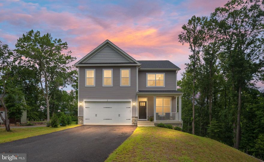 Welcome to this radiant, move-in-ready home with recently finished basement, deck, and fenced in back yard situated on a peaceful 1.28 acre cul-de-sac lot that features beautiful nature views. Before entering the home, you’ll be greeted by a patio perfect for a morning cup of coffee or a relaxing evening under the stars. Pass through the front door and you’ll be charmed by an open-concept made for entertaining. The main level features a spacious living room, kitchen, family room, and dining area. The kitchen boasts granite countertops, stainless steel appliances, a walk-in pantry, and recessed lighting. Unwind by the electric fireplace in the family room, perfect for any time of the year. After enjoying a meal in the spacious dining area, open the sliding glass door to the deck overlooking your peaceful, private backyard. The main level also includes a half bath as well as a mudroom with plenty of storage. Upper-level owner's suite is spacious, equipped with recessed lighting and a ceiling fan, but the real show-stopper? The owner’s bath doubles as a private retreat with its luxurious walk-in shower with dual shower heads, dual vanities, recessed lighting, and ceramic flooring. The owner’s suite also includes a large walk-in closet and linen closet. Upper-level includes three additional bedrooms and hall bath. Laundry room is conveniently situated on upper-level with included washer and dryer. Last but not least is the finished walk-out basement, which is highlighted by a rec room with dimmable, recessed lighting and wall sconces, perfect for watching movies, listening to music, playing games, and making memories. Basement also includes an additional room that could serve a great home office or hobby space. Rough-in has been completed for a future wet bar and kitchen. One potential bathroom currently used as storage space. No HOA. Conveniently located near commuter lots, Brooke Station VRE, MCB Quantico, Route 1, and I-95.