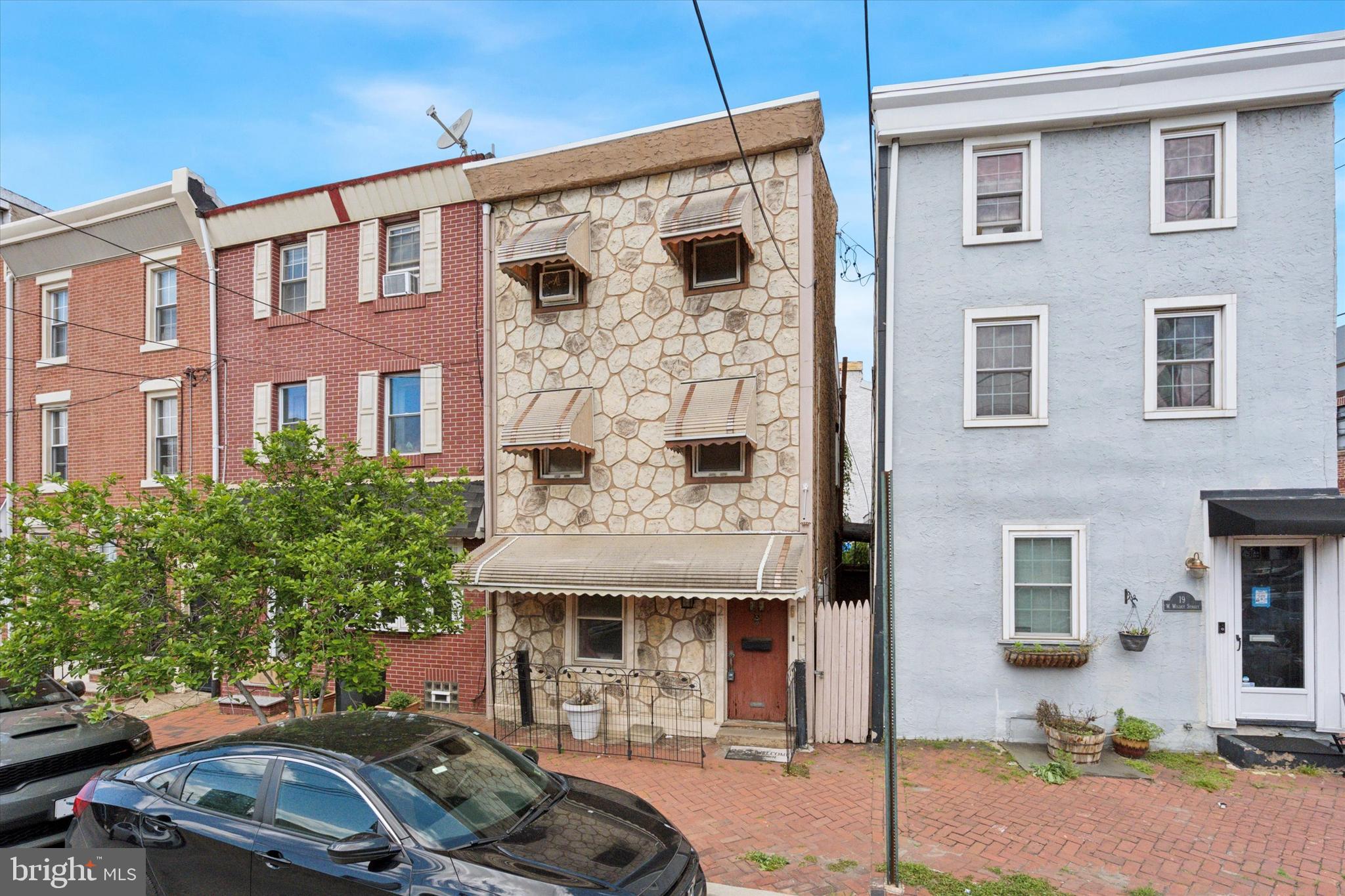 Investor alert! Located on the prime border of Fishtown and Northern Liberties, 21 W Wildey Street is a three-story, semi-detached home that’s bursting with potential. This is the kind of project seasoned investors chase — a blank canvas in one of Philly’s most in-demand neighborhoods. The home features 3 bedrooms, 1.5 bathrooms, a spacious layout, full basement, rear patio space and rare 2 car private driveway, all ready to be reimagined. Surrounded by renovated and new construction homes that have recently sold for \$550K to \$700K+, the upside here is undeniable. The stone façade offers character, and the side alley provides added functionality — a rare feature for city living. Steps from The Piazza, Frankford Hall, and some of the city’s best nightlife, dining, and transit access, this is a location that sells itself. Whether you're looking to fix and flip or buy and hold, this is your opportunity to capitalize on serious equity growth in one of Philadelphia's hottest zip codes. Don’t wait — properties with this location and potential move fast.