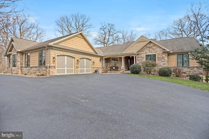 Stunning Golf Course Living on the 14th Green | Susquehanna Valley Country Club Welcome to an extraordinary ranch-style retreat perfectly positioned along the 14th green of the prestigious Susquehanna Valley Country Club. Set on over 5 private acres, this magnificent home offers an unparalleled blend of elegance, comfort, and breathtaking views in over 5,600 square feet of meticulously finished living space. From the moment you step inside, soaring 14-foot ceilings and dramatic floor-to-ceiling windows frame sweeping golf course views, flooding the home with natural light and a sense of grandeur. The heart of the home features a stunning stone gas fireplace, creating a warm and inviting ambiance perfect for entertaining or quiet evenings in. The gourmet kitchen is a chef's dream, boasti

a large center island and top-of-the-line appliances that will inspire culinary creativity. The luxurious primary suite is a true sanctuary, complete with his-and-hers walk-in closets, dual vanities, and a spa-inspired walk-in tile shower.
The main floor offers 4 bedrooms, a dedicated home office or optional 6th bedroom, and 2.5 bathrooms. The fully finished lower level expands the possibilities with a private home theatre, a convenient kitchenette, an additional bedroom and bathroom, and a dedicated home gym -- bringing the total to 5 bedrooms and 3.5 bathrooms across the entire home.
Step outside to the covered patio with skylights and unwind as you watch golfers navigate the 14th -- the perfect backdrop for morning coffee or evening gatherings. A sprawling 4-car garage and over 5 acres of land complete this exceptional property, offering privacy, space, and room to breathe.
Homes of this caliber on the golf course rarely come available. This is luxury living at its finest!