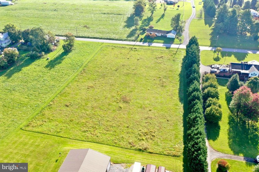 This beautiful roughly 2.5-acre flat and cleared lot is unrestricted and perfectly located in the highly desirable Arden Nolville area. Currently farmed for alfalfa, this land offers incredible potential for your dream home or future investment. Already perc test approved. 

It is also across the road from Berkeley County protected farmland so you can enjoy peaceful, picturesque views that will remain untouched for years to come. 

 Don’t miss the chance to own this beautiful piece of land in a prime location!