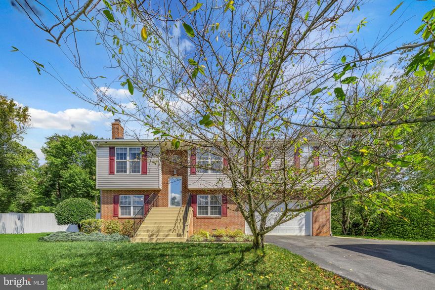 Welcome to 29844 Cheryl Ct, a beautifully maintained custom-built split-level home nestled on 2.37 acres in Mechanicsville. Designed for both comfort and functionality, this extended split-foyer residence boasts 9-foot ceilings, multiple decks, and an above-ground pool—perfect for relaxing or entertaining. The extra-long driveway offers parking for up to six cars, complemented by a spacious 3-bay garage with a mechanic lift for car enthusiasts, and a 10x20 shed with overhead storage.

Inside, the home has been thoughtfully updated with modern finishes. The kitchen shines with quartz countertops imported from Taiwan, stylish backsplash, and a new stove (2024). Fresh paint in the kitchen, living room, and dining room (2024) and new carpeting in three rooms with a lifetime guarantee ensure move-in readiness. Other recent upgrades include a new front door and storm door (2023), redone wrought iron railings (2023), new decking and composite railings for all three decks (2022), and a new pool liner and pump (2022). The roof, replaced in 2019 with 50-year shingles, and replacement windows (2014) add peace of mind for years to come.

This smoke-free, pet-free home has been meticulously cared for with extensive ongoing maintenance: termite treatment (25-year plan), septic pumped September 2022, chimney swept September 2025, yearly lawn and tree care by MRW, and driveway seal coating (2025). Additional upgrades include under-house encapsulation (2014), a Booth’s high-efficiency heat pump and AC with air scrubber (2020), entire house humidifier built into the system, an 80-gallon hot water tank (drained yearly), gutter guards with a lifetime warranty, and a new upstairs carpet (2022).

Outdoor living is equally impressive with three updated decks (12x38, 8x21, 10x12), a covered 11x15 concrete patio with an additional flagstone area, exterior outlets for holiday lighting, and a 10x20 shed on a concrete slab with dual overhead storage lofts. The property is enhanced by mature landscaping, featuring 5 Yoshino cherry trees lining the driveway, 2 Japanese cherry trees that burst into brilliant orange and red hues each fall, a stately magnolia tree, 3 colorful crape myrtle trees (1 purple and 2 pink), and 6 vibrant Encore azalea bushes.

With its blend of modern updates, extensive storage, private acreage, and thoughtfully designed landscaping, this home is truly a rare find.

Mortgage savings may be available for buyers of this listing