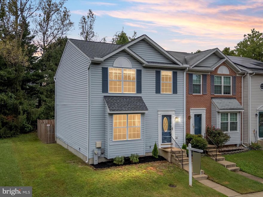 Exceptional townhome nestled in the sought-after Seven Oaks community of Odenton. One of the largest units - boasting 2260 sqft- is thoughtfully designed with a perfect blend of comfort and convenience. New carpet and freshly painted throughout. Step inside to discover an open-concept main level adorned with beautiful LVP floors  creating a warm and inviting atmosphere. The gorgeous kitchen boasts upgraded countertops and ample cabinetry, seamlessly connecting to a spacious dining area and a kitchen nook—ideal for entertaining guests or enjoying big gatherings.  The dining room features french doors for privacy or use the room as an office or play room. On the upper level the  primary bedroom features 2 closets and an upgraded primary full bathroom with tiled walls and upgraded fixtures. Two additional bedrooms and a full bath complete the upper level, providing ample space for family or guests. The  finished lower level that offers versatile space for a home office, gym, or guest suite,  and additional storage. Enjoy serene views from the custom patio overlooking lush woods, offering a private oasis for relaxation. Residents of Seven Oaks enjoy access to a wealth of amenities, including a community pool, fitness center, basketball and tennis courts, and tot lots. Conveniently located near Fort Meade and major commuter routes, this home offers the perfect balance of tranquility and accessibility!