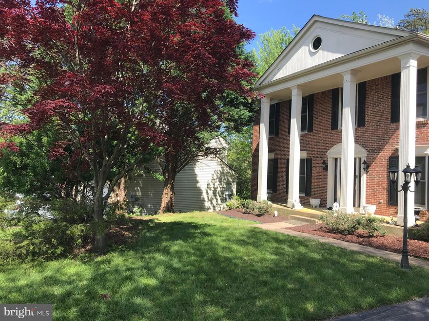 4000+ Square Foot Southern Colonial on Large Lot Backing to Trees. 5 Bed Rooms 3 Full & 1 Half Baths. Formal Living & Dining Rooms, Kitchen with Table Space, Family Room with Gas Fireplace. Full Walk Out Lower Level Boasts Bedroom, Recreation and Living/Dining Area, Kitchenette Area, Over sized Storage Room, Full Garage. Deck with Stairs to Rear Yard. Backs to Wooded Area & Community Pool.