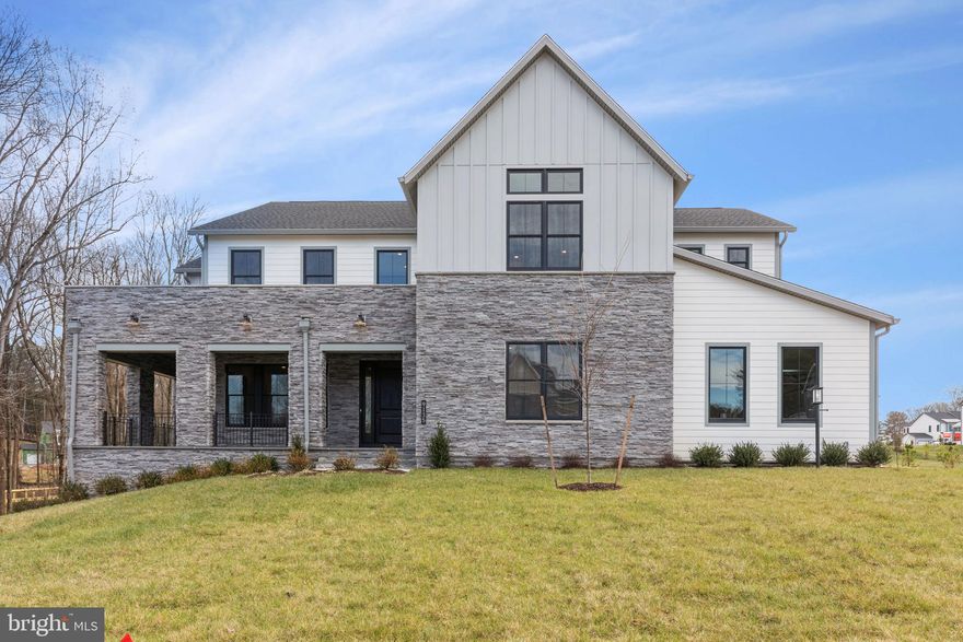 The Warhol Modern Farmhouse is our most popular home design w/a mix of classic & contemporary architectural designs, large windows, open floorplan & high-quality finishes! The sizeable backyard offers endless possibilities and will accommodate outdoor activities from sports to BBQs & relaxation. The walkout basement offers lots of natural light, a large bedroom w/full bath and an expansive rec room with a rough-in for a wet bar & room for additional finished spaces. Two kitchens is a chef’s dream! Each bedroom has its own bath to ensure privacy and convenience. The oversized main level bedroom suite is perfect for multi-generational living. A covered deck provides a comfortable & protected space to enjoy fresh air, outdoor meals & relaxation regardless of the weather! Immediate delivery!