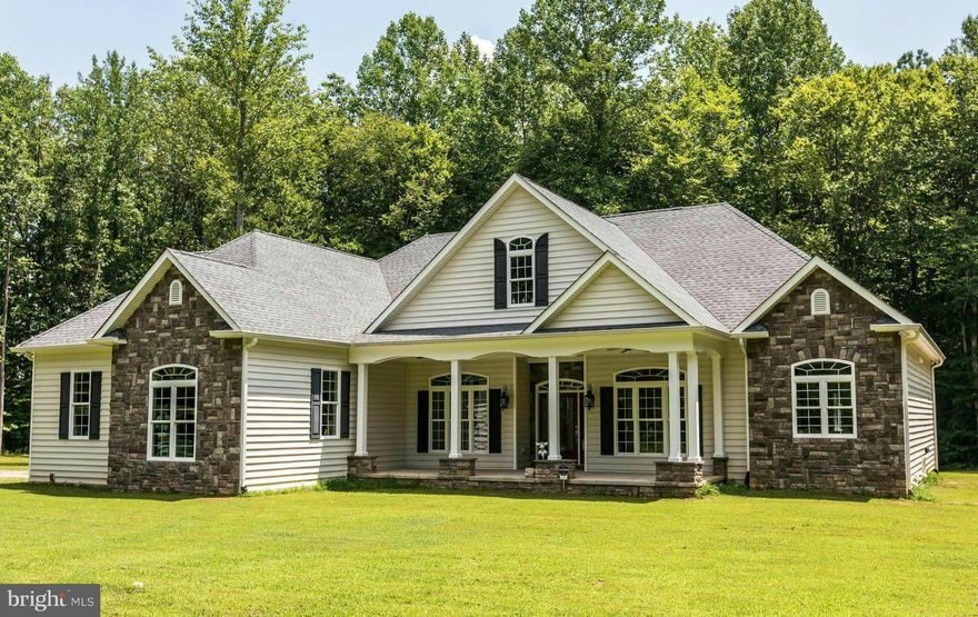 Peaceful retreat on 17 wooded acres! Your own private hunting grounds! Custom built home w/6800sqft! Quality touches thru out: 10' ceilings, teak flrs, transom windows, lighted trey ceilings & more! Enjoy entertaining w/gourmet kitchen, house surround sound, rec rm w/10' wet bar,wine cooler, room for pool/game tables, Home Theater w/stadium seating, 133" screen! Beautiful stone patio & fireplace!