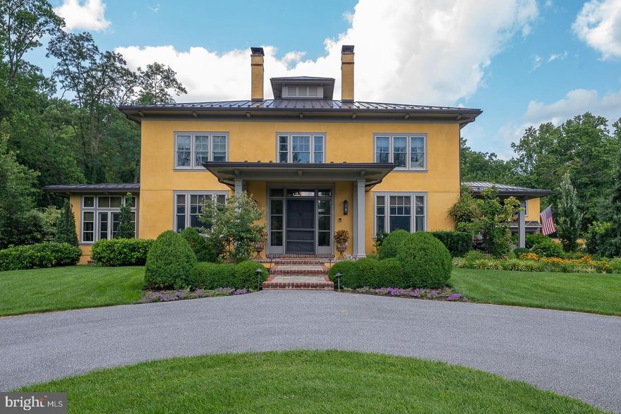 Originally constructed in 1890, this Art Deco-style home was rebuilt after a fire in 1919.  Fast forward to 2014 when purchased in total disrepair, 3501 Goshen Road rose from its former shadows into the exquisite 
'Northern, Modern Plantation House' you see today.  

Sequestered on the 3.3-acre lot are the main residence, the detached 3-car garage, pool house and terrace, and a 2nd floor 1-bedroom luxury apartment.  Landscaping includes a fenced cutting garden, herb garden, wildflowers, and an assortment of tall grasses and foundation hydrangeas protected by perimeter evergreens.  The restored original pool settles serenely into the manicured lawn.

An interior Entryway of glass transoms and sidelights leads into the 2-story fireside Great Hall with an upper-level surrounding promenade.  4 ensuite Bedrooms and an oversized Laundry/Craft Room complete the 2nd floor.  Downstairs, a large fireside Library leads to the Primary Bedroom wing with bay windows overlooking the pool.  A sumptuous Bathroom, 2 walk-in closets, and a personal Laundry perfect the Owner's Suite.  The handsome fireside Dining Room graciously opens into the Gourmet Kitchen or onto a lovely Veranda. The Gourmet Kitchen is enhanced by a soapstone center island featuring a Galley sink with double designer faucets.  The perimeter counters are quartzite. A bright Breakfast Area opens through double French doors to a large terrace overlooking the pool.  The multipurpose Mud Room is the perfect blend of functionality and style, acting as a transitional space that keeps the rest of the home clean and organized.

Location, Location, Location! Newtown Square is ideal for those looking for a balance between suburban tranquility and city accessibility, with top-tier amenities and a strong sense of community.  The recent renaissance of Newtown Square offers many upscale dining options. 3501 Goshen Road is surrounded by great schools, public and private, prestigious country clubs and the revered Radnor Hunt Club.  It also provides easy access to major highways for commuting to Philadelphia, the Main Line, Philadelphia International Airport, and Wilmington, DE.  Create your own legacy in this stunning historic home! 
SHOWINGS BEGIN THURSDAY, APRIL 10TH