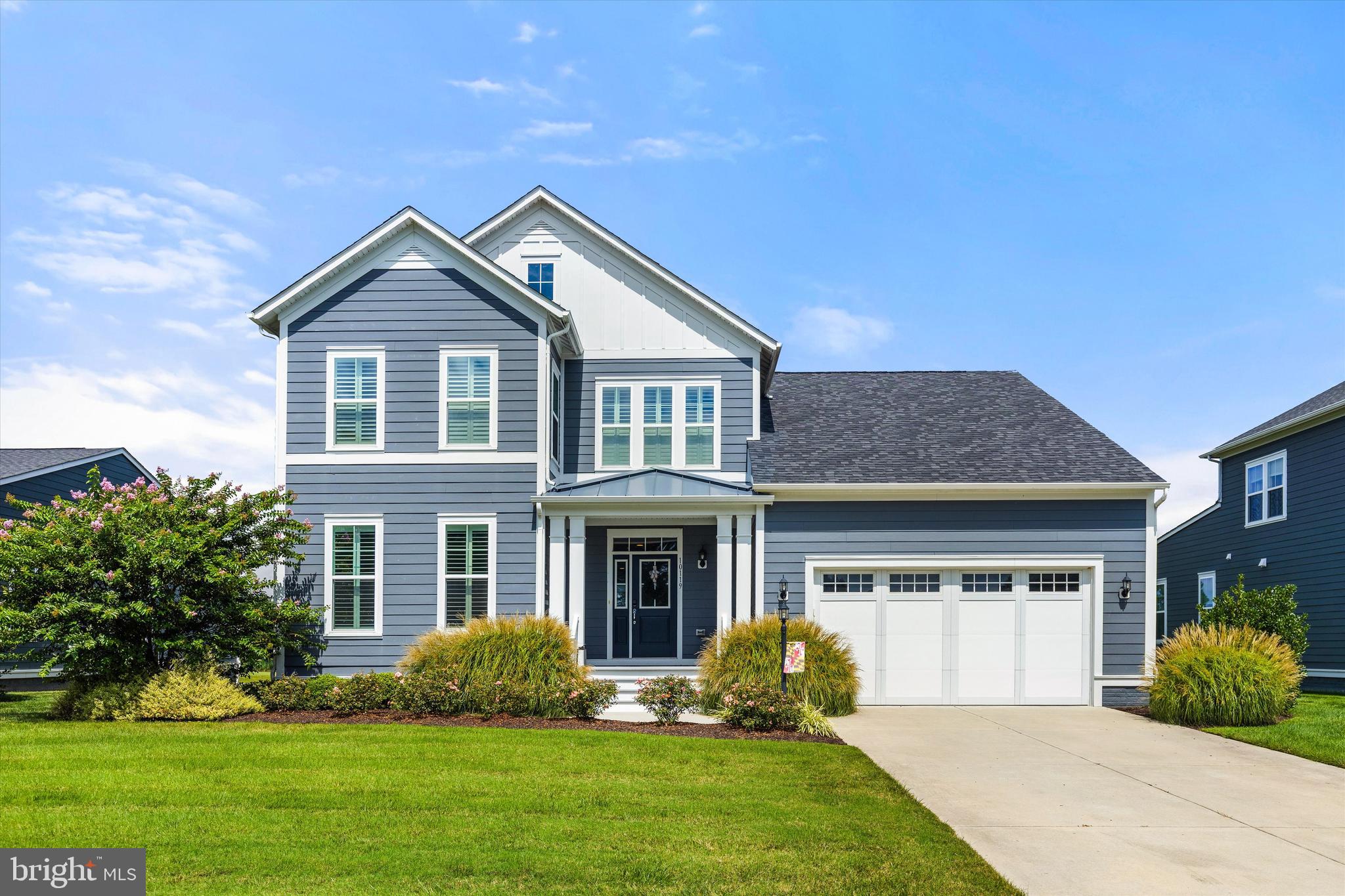 This stunning move-in-ready home offers breathtaking views of serene ponds and the 16th hole of the War Admiral Golf Course. Nestled in the highly desirable, gated community of Glen Riddle, it's just minutes from Ocean City's beautiful beaches, Assateague Island and the charming historic town of Berlin. Featuring a first floor primary suite, this home is packed with premium finishes and modern upgrades.
Upon entering through the covered front porch you immediately notice the open floor plan that enhances the natural light pouring in from the expansive 16 foot sliding door and numerous windows.
The gourmet kitchen is a chef's dream, featuring a 9 foot island, high-end gas stove and flows seamlessly into the family room making it perfect for everyday living and entertaining. The spacious Trex deck off the family room is an ideal retreat for unwinding and enjoying the wildlife.
The first floor primary suite boasts a spacious walk-in closet and an impressive en-suite bath with a 7 foot shower, luxurious two-person soaking tub and a 10 foot vanity with quartz countertops. Additionally, there is a convenient walk-in laundry room with a utility sink. Upstairs, the 9 foot ceilings create an airy feel, featuring a versatile loft and two generously sized bedrooms with a shared Jack and Jill bathroom.
This home also includes beautiful plantation shutters, hardwood flooring and custom lighting throughout. Located in the amenity-rich Glen Riddle community, residents can enjoy access to an outdoor pool, lit tennis and pickleball courts, two golf courses, a sports lounge, rental hall, 96 slip marina and a Ruth's Chris Steak House. The home can be sold furnished or unfurnished, offering flexibility.