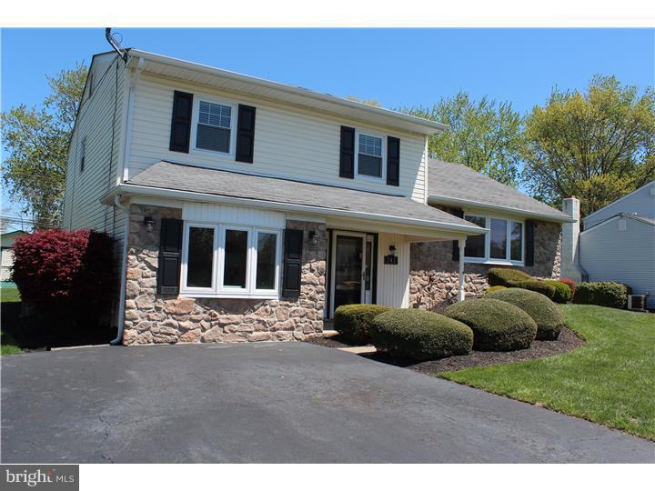 What a cutie! Dream house condition! Wonderfully maintained and updated home welcomes you HOME from the minute you step inside the clean and neat ceramic tiled foyer. Open & airy floor plan leads you right into the family room with new hardwood flooring, bright windows and door to patio. Back stairs take you up to the kitchen that has been updated with stainless appliances, new ceiling fan and slider out to the deck. Kitchen is open to dining area(old original wall removed) for lots of room for big table or to add a kitchen island etc. Living room is bright and airy and adds more room. Upstairs, main bedroom is spacious and has new carpet and an updated full bath with large tiled shower. 2 other large bedrooms have plenty of closet space and share a good sized hall bath. Garage has been converted to 4th bedroom which is currently an adorable playroom--allowing the rest of the house to be neat and orderly!! Great big backyard with lovely deck and patio--great outdoor spaces for the warm weather! All the big jobs have been done for you-- Siding, windows a gutters are all newer.