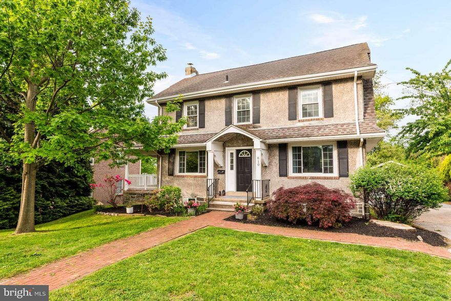 Set on a ½ acre lot, this home is perfectly positioned for active suburban living and the "walkability" feature that every buyer is looking for! Step inside to a lovely center hall featuring a graceful turned staircase. To the left sits an expansive living room bathed in natural light from oversized windows. This inviting space is anchored by a classic wood-burning fireplace set beautifully between twin doors that open to a lovely brick deck for a seamless indoor-outdoor transition. The traditional layout flows effortlessly into the formal dining room. The kitchen is designed for both function and connection, featuring counter height seating, perfect for casual morning coffee, access to a cozy back deck, and a lovely breakfast nook that could easily be transformed to become a butlers panty or even a home office space. A discrete powder room tucked away completes this level. The second floor offers 4 spacious bedrooms, a full bathroom, cedar closets and full size stairs leading to the third-floor. The expansive attic could easily be converted to a master suite or even 2 additional bedrooms. The walk-out basement is a hidden gem—the perfect canvas for a premier recreation room or gym. From the basement walk directly to the gigantic private backyard with endless possibilities for outdoor fun and a huge 2 car garage. This traditional beauty is now ready for a new steward to usher its timeless charm into the next generation. The new owner will discover that its location, specifically "Saxer Ave" is truly an amazing feature! A short walk to the trolly, dining on Saxer, parades, and so much more.