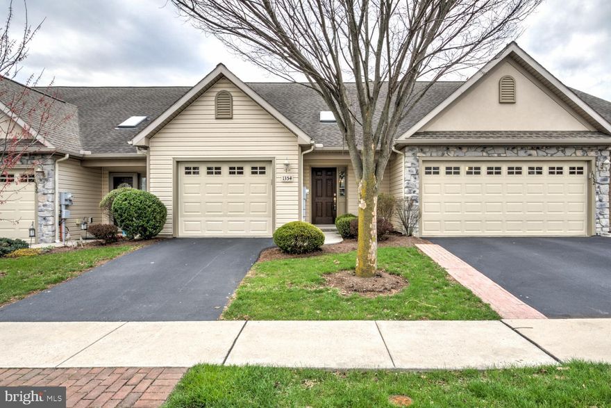 Welcome to the wonderful experience at 1354 Fieldstone Dr Mount Joy! Imagine carefree living in a carefully maintained community designed to encourage a relaxed, maintenance-free way of life that lets you focus on the things you love most. This pristine townhome known as the Cambridge Model built by Larry Dombach quality homes, offers 1462 ft of convenient well crafted, single story living offering 3 beds, 1.5 baths as well as a delightfully sky lit two story central floor plan, along with dedicated laundry, Energy Efficient heat pump and Central Air, spacious one car garage amazing shelving, storage and shop bench area as well as a lovely back porch offering access to the walking paths and access to the neighboring park and just a bit further the small shopping complex for all you necessities. The HOA takes care of mowing, snow removal, grounds maintenance and common areas. Walking this impressively kept community is a joy! Located only a mile from Route 283 and a few more to Route 30 this home is near to it all! If you're looking for in mint condition home with less headaches and one that represents as great values – this home is for you!