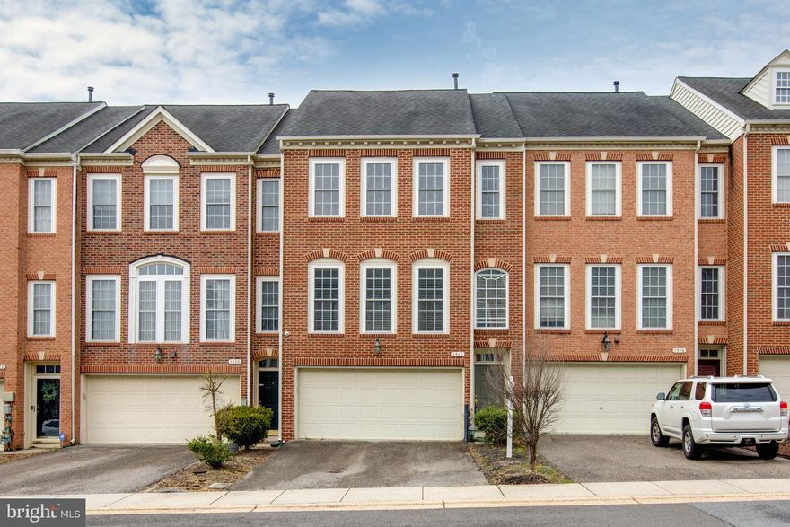 Welcome to 1518 Hurley Ct, a beautiful move-in-ready NVHome townhome located in the sought-after Villages of Dorchester community! This spacious home features a bright and open layout with hardwood flooring throughout the main level and large floor-to-ceiling windows that fill the home with natural light. The main level offers a seamless flow between the living, dining, and kitchen areas, perfect for both everyday living and entertaining. Upstairs, the primary suite features a cathedral ceiling, ample closet space, and a private en-suite bath. Two additional generously sized bedrooms and a full bathroom complete this level. The top-level loft is a standout feature, complete with its own full bathroom ideal for a guest suite, home office, or private retreat. The fully finished walk-out basement provides additional living space, perfect for a recreation room, gym, or flex space to fit your needs. Step outside to a large deck overlooking an open yard, offering a great space to relax or entertain. Conveniently located near major commuter routes, shopping, and dining, with access to community amenities, this home offers both comfort and convenience. Don't miss the opportunity to make this home yours!