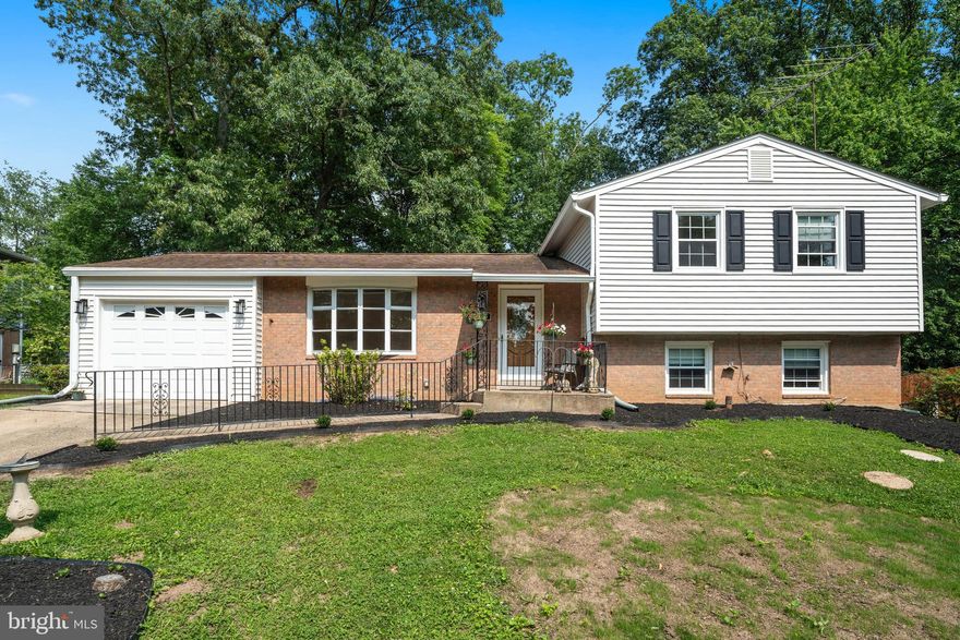 Welcome to this beautifully maintained 5-bedroom, 3-bathroom home in the highly sought-after Rolling Valley neighborhood! Located in the preferred West Springfield High School, Irving Middle, and Rolling Valley Elementary school pyramid, this spacious 4-level split offers the perfect blend of comfort, charm, and convenience. Step into a bright and airy living room featuring a large bay window that fills the space with natural light. The formal dining room is adorned with elegant crown molding—ideal for hosting memorable gatherings and holiday meals. From here, step out onto the rear deck and unwind while enjoying views of the serene, private backyard. Upstairs, you’ll find four generously sized bedrooms and two full bathrooms. The first lower level offers a cozy family room with a fireplace, an additional bedroom, a half bath, and a convenient laundry room. The second lower level provides a versatile recreation room—perfect for a home gym, hobbies, or play area. This home is situated in a friendly community with unbeatable access to major commuter routes, including I-95, I-495, I-395, and Fairfax County Parkway. Enjoy easy access to the VRE, the Pentagon Express Bus, and the Franconia-Springfield Metro. You’ll be just minutes from the Springfield Town Center, Trader Joe’s, Whole Foods, Starbucks, Giant, and a variety of local dining spots. Outdoor lovers will appreciate nearby Hidden Pond Nature Center, Pohick Creek Stream Valley Park, Lake Accotink, and membership opportunities at the Rolling Valley Swim & Tennis Club. Don’t miss your chance to own this spacious and welcoming home in one of Northern Virginia’s most desirable neighborhoods! Owner will provide a 1 year home warranty from First American Home Warranty