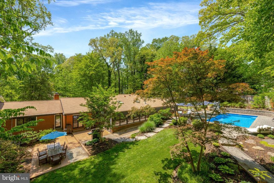 Exceptional Retreat in the Heart of Mantua –on almost 1 acre,  with In-Ground Pool, Luxury Finishes & One-Level Living. Tucked away on a peaceful cul-de-sac in one of Fairfax County’s most coveted neighborhoods, this extraordinary Mantua estate offers over 5,000 finished square feet of thoughtfully designed living space, all on a lush 0.88-acre lot. With 6 bedrooms and 5 full bathrooms on a single level, this home blends luxury, comfort, and versatility—perfect for multigenerational living, remote work, and gracious entertaining.

Step into your private backyard oasis featuring a heated in-ground saltwater pool, hot tub, koi pond, and professionally landscaped, fully fenced yard. Whether you're hosting summer gatherings or enjoying a quiet evening under the stars, this space delivers resort-style living at home.

Interior Highlights Include:
Two luxurious primary suites, including a recent 800+ sq ft addition : private retreat with spa-inspired bath, oversized shower, soaking tub. Huge walk-in closet.

Beautiful gourmet kitchen.  Wolf stove, Sub-Zero refrigerator, cherry cabinetry, granite countertops, and built-in butler’s pantry with shelving. Sun-filled open layout with expansive picture windows and custom hardwood floors. Multiple flexible living areas—ideal for home offices, playrooms, or guest quarters
Unique octagon addition with two bedrooms and kitchenette, offers a tranquil space for a reading room,  artist studio, yoga/exercise studio, or guest suite. Main-level laundry and abundant storage throughout. Additional Features include an oversized 3-car garage with extra storage. No HOA. Top-rated Woodson High School pyramid.   

Neighborhood offers a Swim and Tennis Club, local trails, parks, and countless community events.  1 block to Eakin Park within the neighborhood with 2 public tennis courts, tot lot and basketball court.  The Fairfax County Cross County Trail is just a few mintues walk from the property also.    Prime Commuter Location:  5 minutes to I-495 and Pickett Shopping Center (Trader Joe’s). Quick access to I-66, Route 50, Route 29, and I-395. Close to Vienna & Dunn Loring Metro stations. 15 minutes to Tysons Corner, Mosaic District, and Inova Fairfax Hospital.

 Open SundayJune 1, 2-4 pm.