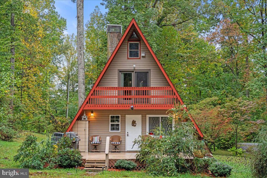 Don't miss this opportunity! Cozy A-frame house nestled on 1 acre of serene land, just a short walk from the lake. Enjoy fishing, kayaking, and swimming right at your doorstep. This charming home features three bedrooms, two full bathrooms. Relax by the wood-burning stove/ fireplace, perfect for chilly evenings. It’s ideal for gatherings or a peaceful retreat. Experience the ultimate cabin lifestyle!