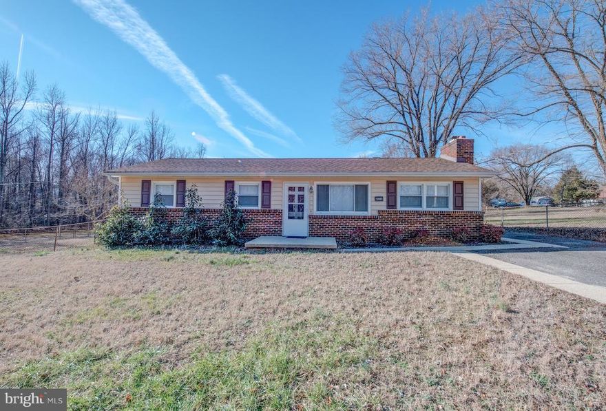Enjoy single-level living in this thoughtfully updated four-bedroom, one-bathroom home. The inviting eat-in kitchen features modern touches and ample space for daily meals and entertaining. Bright, open living areas flow seamlessly, with thoughtful details throughout. Relax on the covered back porch and take in the peaceful views of nature.
Located off a quiet, less-traveled road in the heart of White Plains, this home offers convenient access to all commuter routes into Washington, DC, and Virginia, as well as nearby military bases. Please note: a detached garage is on the property but does not convey, as it is currently used by the owner, time to time.