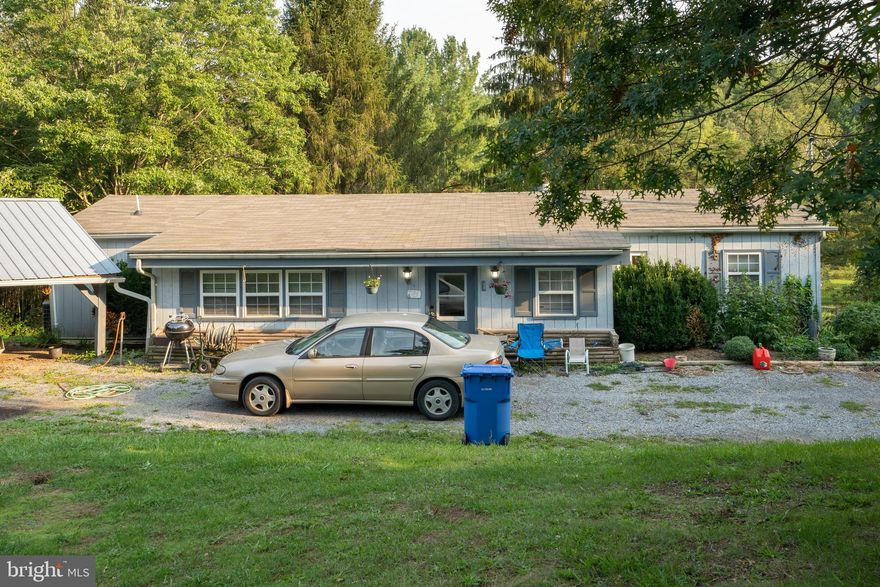 Unique living and investment property in the beautiful Berkeley Springs Area. The main house has been completely renovated including the roof, kitchen, flooring and counter tops. Open concept design with a sitting/living area right off of the kitchen. 3-4 bedrooms (potential 4th bedroom or office) and 2 bath home. This property allows you to surround yourself with nature while being just 10 miles from town, 20 miles from I-70 and I-81! Whether you live year-round or as a weekend retreat you are bound to always be close to something to do and enjoy.

The rental property is 3 bedroom 2 bath. Currently being rented out on a month to month basis. 
Both homes share a well but are on separate septic systems. This property has great income earning potential with the right buyer or use to suit your needs.