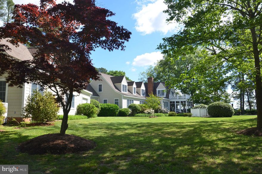 "Oak Point" is a classic "Eastern Shore Waterfront Estate." Located in the Bozman area of Talbot County, MD, just a short distance outside St. Michaels, the  premier 3.2-acre point of land (with over 1,000 ft. of shoreline) provides high elevation and commanding views across the confluence of Broad, Edge and San Domingo Creeks. The panoramic, 270-degree views are simply extraordinary! Improvements include a very high-quality main house, designed to maximize the water views from every room. Constructed in 2001 by skilled Amish craftsmen, the house features a gracious entry hall, bright, generous-sized rooms and hardwood floors throughout. Wonderful living/family room w/oversized brick fireplace and custom mantle. Comfortable library/study w/wall-mounted television. Outstanding gourmet kitchen w/waterside breakfast room. Brick-floored screened porch. Spacious downstairs primary suite. Upstairs, you will find 2 ensuite guest bedrooms (one with a large private balcony) plus a large bonus/exercise room w/private bath.  The main house has 3 bedrooms (plus bonus room w/bath) and a total of 4.5 baths.
So much more! There is a charming 1950's 3-bedroom guest cottage w/1.5 baths at the south end of the property; detached 2-car garage plus a climate controlled 3-car garage; workshop; private office and game room above the garage. Waterside swimming pool (heated). Private beach near the guest cottage to launch canoes and kayaks. Substantial 225' pier w/2 boat lifts provides 8' of water depth at MLW. This is a premier boating/fishing location within easy cruising distance to Tilghman Island, Oxford and the open waters of Choptank River and Chesapeake Bay. This property serviced by underground electric and "Breezeline" high speed internet service.
