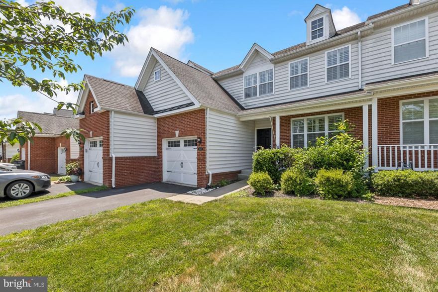 Welcome to 15447 Painters Cove Way, an exceptional Toll Brothers Carriage Home nestled within the prestigious gated community of Dominion Valley Country Club in Haymarket. 

This beautifully maintained 3-bedroom, 3.5-bath brick and siding residence offers a thoughtfully designed layout filled with timeless architectural details and modern updates, creating the perfect blend of comfort, elegance, and functionality.

Rich hardwood floors, and elegant crown molding on the main level, custom window shutters on both the main and upper levels add warmth and sophistication throughout the home. From the moment you arrive, the charming curb appeal and welcoming front porch set the tone for the quality and care found inside.

The main level features a dining area adorned with classic shadow box molding—ideal for hosting gatherings and special occasions. The spacious eat-in kitchen is appointed with granite countertops, a large center island, recessed lighting, and abundant cabinetry, seamlessly opening to the inviting family room. Just off the family room is a screened-in deck with sun-blocking blinds provides the perfect setting for relaxing or entertaining while enjoying true indoor-outdoor living. A one-car garage and convenient walkout access further enhance everyday practicality.

Upstairs, the primary suite serves as a private retreat, complete with a custom-finished walk-in closet and a well-appointed en-suite bath. Generously sized secondary bedrooms offer flexibility for family, guests, or a home office. The upper-level laundry room adds convenience and includes a newer Samsung washer and dryer.

The fully finished walkout lower level expands the living space with a spacious recreation room, a full bath, and an oversized storage area—ideal for hobbies, a home gym, or additional organization. Additional highlights include ceiling fans throughout, a smart thermostat system servicing both A/C units, and a new attic A/C unit installed in 2023.

Enjoy the resort-style lifestyle and exceptional amenities that Dominion Valley Country Club has to offer, all within a secure, gated community in the heart of Haymarket.