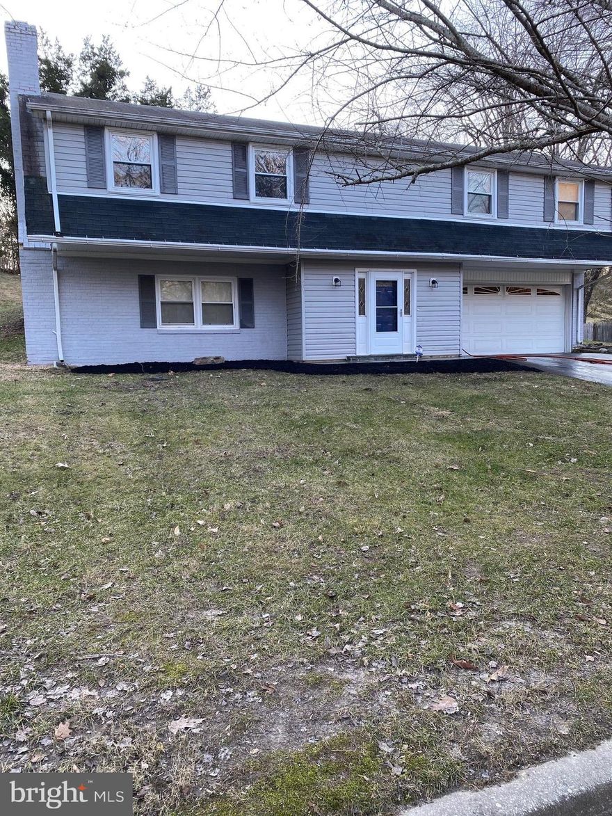 Back on the market! Financing fell through. Charming 3 Br/3 Ba home with recent updates to flooring, finishes and appliances. Spacious family room with fireplace, full bath and laundry on main level. 2nd level features an eat-in kitchen with pantry closet, open floor plan for dining and living room, master bedroom with full bath and 2 additional bedrooms and a hall bath.  Sliding doors walk out to a lovely deck for grilling and entertaining that overlooks a huge yard with open space beyond the property line. You will find plenty of room in the 2 level shed for storage and the garage is big enough for a car plus lots of room for additional storage.  The Marlton neighborhood is ideal for commuting to DC or Baltimore and shopping and restaurants are within walking distance. Marlton golf course and clubhouse are under renovation and new management and the community features a pool, several parks and walking trails throughout.  Come take a look at what Marlton has to offer. This house will not last long!