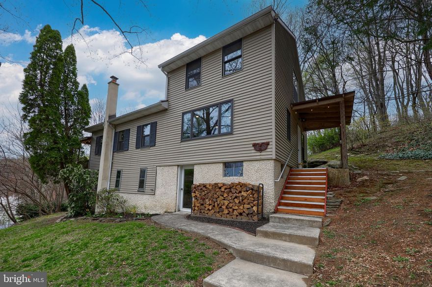 Nestled on over an acre of serene views within Penn Manor School District, this inviting 3-bedroom, 2-bath home blends comfort and convenience. The spacious kitchen features a dining area and ample cabinet storage, while the partially finished walk-out lower level includes a cozy wood stove—perfect for gatherings. Step outside to the covered deck or side porch, both overlooking a generous yard ideal for outdoor enjoyment. A detached 2-car garage adds convenience for storage or projects. With its peaceful setting and flexible living spaces this property offers a rare mix of space, privacy, and modern convenience.