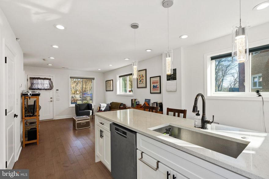 This marvelous home is vacant and waiting for the next owner to call 89 58 TH ST SE home sweet home. The current owner not only took impeccable care of this semi-detached dwelling but he also elevated it year after year both inside in out.  In every way possible, this fine home was taken to the next level and  every bit of space has been made useful. It is the utmost joy to help a client buy a place that is even more exceptional a few years later when it is time to sell.  This mint condition three story with three bedrooms and two full bathrooms is beaming with natural light from the East, south and west exposures.  The kitchen is elegant and spacious and ready for lots of hosting. The yard is completely fenced and primed for relaxing and entertaining. Private driveway plus plenty of street parking with just a few blocks to the metro station.  This lovely home has it all.