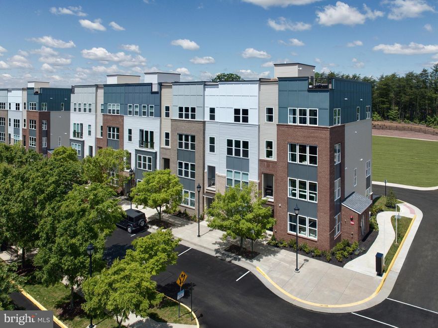 Discover the epitome of modern convenience at Neabsco Commons, Drees Homes' newest community of townhome condominiums in Woodbridge, VA. Enjoy a vibrant lifestyle just steps away from Stone Bridge Commons, offering a diverse array of dining, shopping, entertainment, and fitness options, including Wegmans.  Our thoughtfully designed two-level townhomes feature open floor plans, one-car garages, and low-maintenance living. Personalize your space with a wide selection of designer upgrades. The Ian floor plan boasts a spacious main level and an upper level with three bedrooms, 2.5 baths, a loft, and laundry room. The luxurious primary suite includes a private outdoor terrace (optional bonus room available), an en-suite bathroom with dual vanities, a separate water closet, and a walk-in closet.  
Perfectly located near I-95, Route 1, and DC, Neabsco Commons offers the best of both worlds: urban accessibility and suburban comfort.