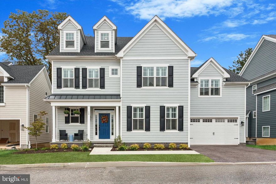 Welcome to 19 Branch Avenue!  This one-year-old home boasts 3,530 square feet of luxurious above grade square footage, four bedrooms, three full and two half bathrooms, a finished basement with egress, and a two-car front entry garage with inside access.  The attractive front elevation includes a covered front porch, hardie plank siding, stone to grade, standing seam metal roof, gable dormers, carriage style garage door, and a gorgeous color palette.  The first-floor features: welcoming entry hall; office with double 15-lite glass doors; formal dining room with custom moldings and plantation blinds; dry bar with beverage refrigerator, cabinetry, subway tile backsplash, and double door pantry; powder room with pedestal sink; family room with direct vent gas fireplace and a 4-panel slider providing access to the rear yard; mudroom with custom wainscotting and bench off the garage.  The gourmet kitchen is the centerpiece of the home offering custom white cabinets with crown molding, quartz countertops, oversize center island with overhang seating, tile backsplash, and stainless-steel appliances.  Gorgeous oak switchback stairs with direct set spindles and matching oak rails lead to the second floor.  The primary bedroom suite will be your oasis.  There’s a spacious sleeping area with triple window, blackout and silhouette motorized blinds, comfortable sitting area, two walk-in closets and a stunning bathroom with herringbone tile floor, double bowl vanity with quartz countertop, free standing soaking tub, and stall shower with floor to ceiling subway tile and frameless glass enclosure.  Three secondary bedrooms, two full bathrooms (Jack and Jill and en-suite), and a large laundry room with cabinets and sink complete the second floor.  Another flight of stairs leads to an incredible finished loft area with plenty of room to entertain, relax, or work from home.  There’s also plenty of finished storage on this floor.  The fully finished basement has an exercise room with vinyl plank floor, a recreation room with storage closet, a half bathroom, and an unfinished space providing addition storage.  Additional features include nine-foot ceilings on the first level, ample recessed lighting throughout, hardwood floors throughout the main level, fresh neutral paint throughout, ceiling fans in all bedrooms and the loft, hardie plank siding on all sides, and a covered rear porch with composite decking.  This amazing home is walking distance to downtown Berwyn and the Septa Regional Rail, close to all major commuter routes, shopping, dining, and is part of the top rated Tredyffrin-Easttown School District.  You don’t want to miss this opportunity!