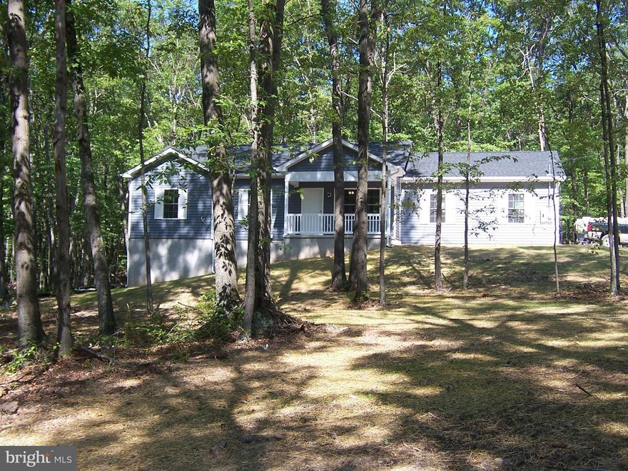 WILD AND WONDERFULL -IN RURAL W VA. 3 BEDROOMS 2 FULL  BATHS ON 1.5 AC LOT, STICK  BUILT -FULL BASEMENT UNFINISHED -WITH  ROUGH IN BATH FOR LATER  USE-TREEED LOT -JUST BEING BUILT NOW SO TIME TO BUY NOW FOR YOUR PICKS THAT HAVE NOT BEEN ORDERED ROOF GOING ON TODAY - 2 CAR  GARAGE OVERSIZE- HOA IS NOT ACTIVE IN COLLECTING FEES- SOME COVERANTS - COVERED FRONT PORCH- LIV AND DINNING  COMBO- WITH COUNTRY KITCHEN NEW STAINLESS APPLIANCES--*BUYER TO PAY TRANSFER STAMPS* NO DECK -- BUILDER INSTALL 2  CEILING  FANS- HOME WITH HEAT PUMP-WELL- SEPTIC-- 1 YEAR  BUILDER WARRENTY  -SAY GOOD BY TO CITY- COULD BE IN BEFORE SCHOOL STARTS ONLY MINS FROM  WINCHESTER -VA