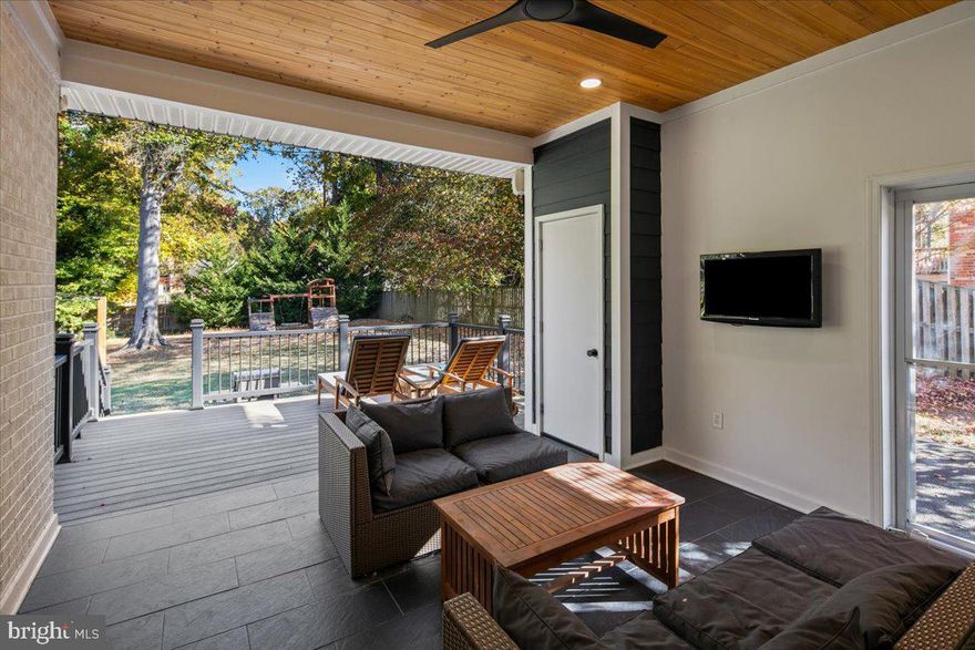 Fantastic opportunity for one level living with all the improvements already completed in highly desirable Yacht Haven Estates community! Bright and open main level features updated stylish white kitchen open to dining and family room with focal point fireplace. Rarely found 4 main level bedrooms! Main level leads to incredible covered patio equipped with tv and deck/concrete patio overlooking expansive fully fenced and level half acre rear grounds. Incredibly spacious walk out lower level with rec room, full bath, laundry, full second kitchen, and tons of storage space. Incredibly flexible floor plan for those seeking two separate living spaces. Impressive list of recent improvements include: fully renovated kitchen in 2019 (cabinets, quartz counters, LG stainless appliances and Sharp microwave, farmhouse sink, and island with overhang for seating), opened and expanded stairway to lower level including new railing (2019), new enlarged kitchen windows and dining room windows to back yard (2019), low profile ceiling fans added to all bedrooms (2020), fireplaces renovated with new tile and custom concrete hearths (2020), lower level living room renovated with new flooring, lighting, molding, and closet doors (2020), lower level mudroom renovated with new tile, cabinetry, built in seating, lighting, and storage closet (2021), all 3 bathrooms fully renovated with enlarged primary bath/walk in shower, guest bath with deep soaking tub, and built in shelving, lanai created with cedar ceiling and tile floor (2022), enclosed area for workshop/storage room with Hardie-siding, storm door, and upgraded lighting/ceiling fan, Trex deck 2022), stamped concrete patio/retaining wall (2022), driveway replaced with added side parking along enclosed patio (2022), water heater replaced (2022), main water line and sewer connection (2023), roof replaced and gutters (2023), upgraded electrical throughout main living areas with low profile led recessed lighting, maestro dimmers, and three way switches and rectangular outlets (2018-2025), and new front door installed (2025). Conveniently located just a short walk to the Mount Vernon Yacht Club and Grist Mill Park and short distance to Fort Belvoir, Mount Vernon Estate, Mount Vernon Country Club, Old Town Alexandria, Pentagon, and all Washington DC has to offer!